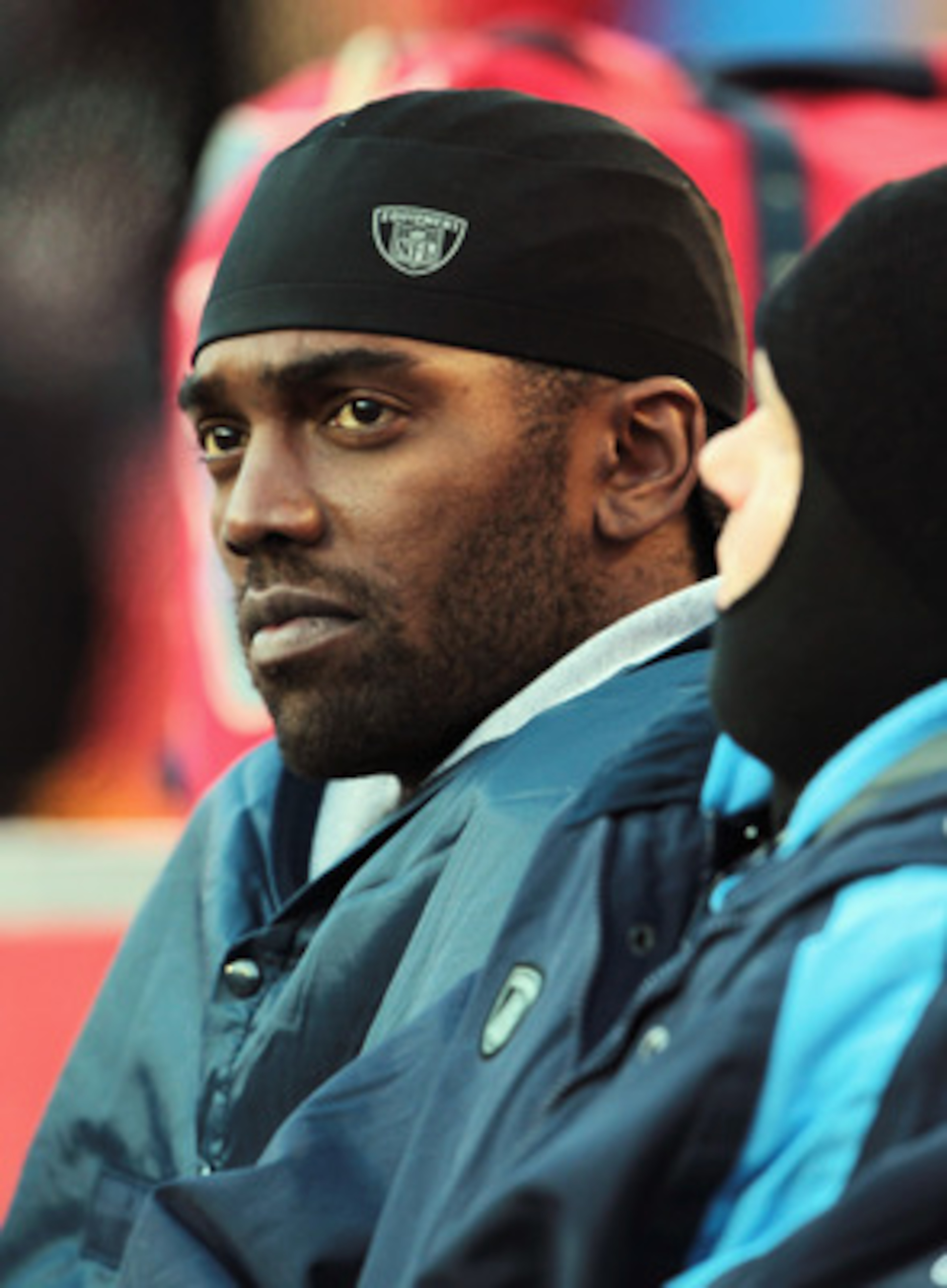 KANSAS CITY, MO - DECEMBER 26:  Receiver Randy Moss #84 of the Tennessee Titans watches from the sidelines during the game against the Kansas City Chiefs on December 26, 2010 at Arrowhead Stadium in Kansas City, Missouri.  (Photo by Jamie Squire/Getty Ima