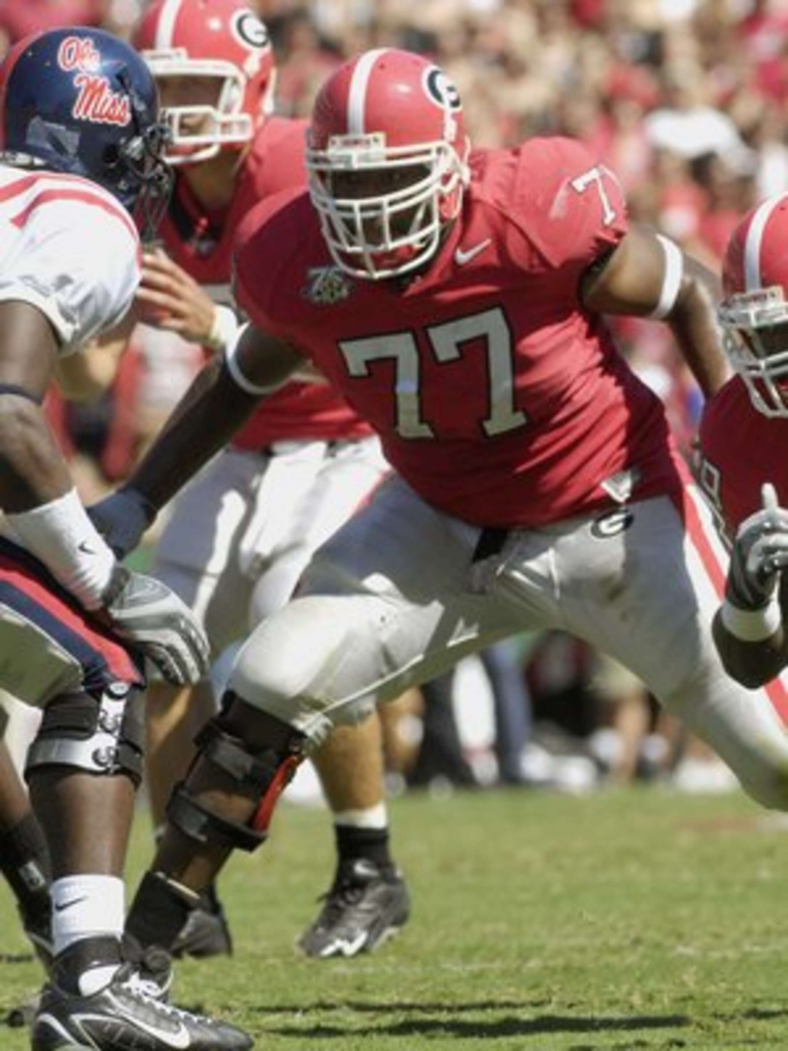 ATHENS, GA - SEPTEMBER 29: Tackle Trinton Sturdivant #77 of  the Georgia Bulldogs sets to block against the Mississippi Rebels at Sanford Stadium on September 29, 2007 in Athens, Georgia.  Georgia won 45 - 17. (Photo by Al Messerschmidt/Getty Images)