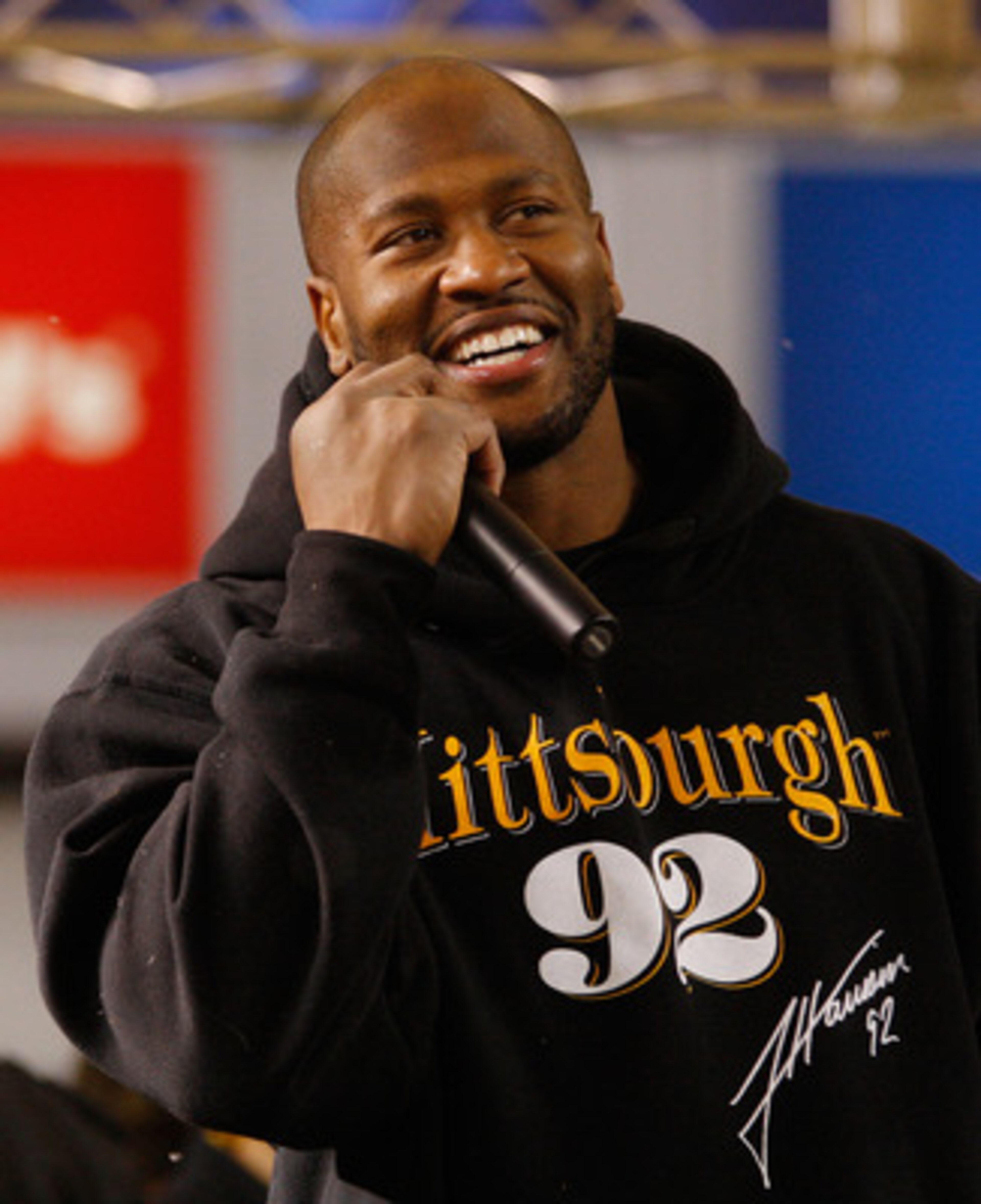 PITTSBURGH - JANUARY 28:  James Harrison #92 of the Pittsburgh Steelers talks to fans during the Super Bowl XLV Pep Rally on January 28, 2011 at Heinz Field in Pittsburgh, Pennsylvania.  (Photo by Jared Wickerham/Getty Images)