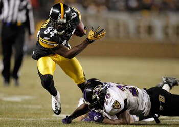 PITTSBURGH, PA - JANUARY 15:  Wide receiver Antonio Brown #84 of the Pittsburgh Steelers runs with the ball after a catch against the Baltimore Ravens in the AFC Divisional Playoff Game at Heinz Field on January 15, 2011 in Pittsburgh, Pennsylvania.  (Pho