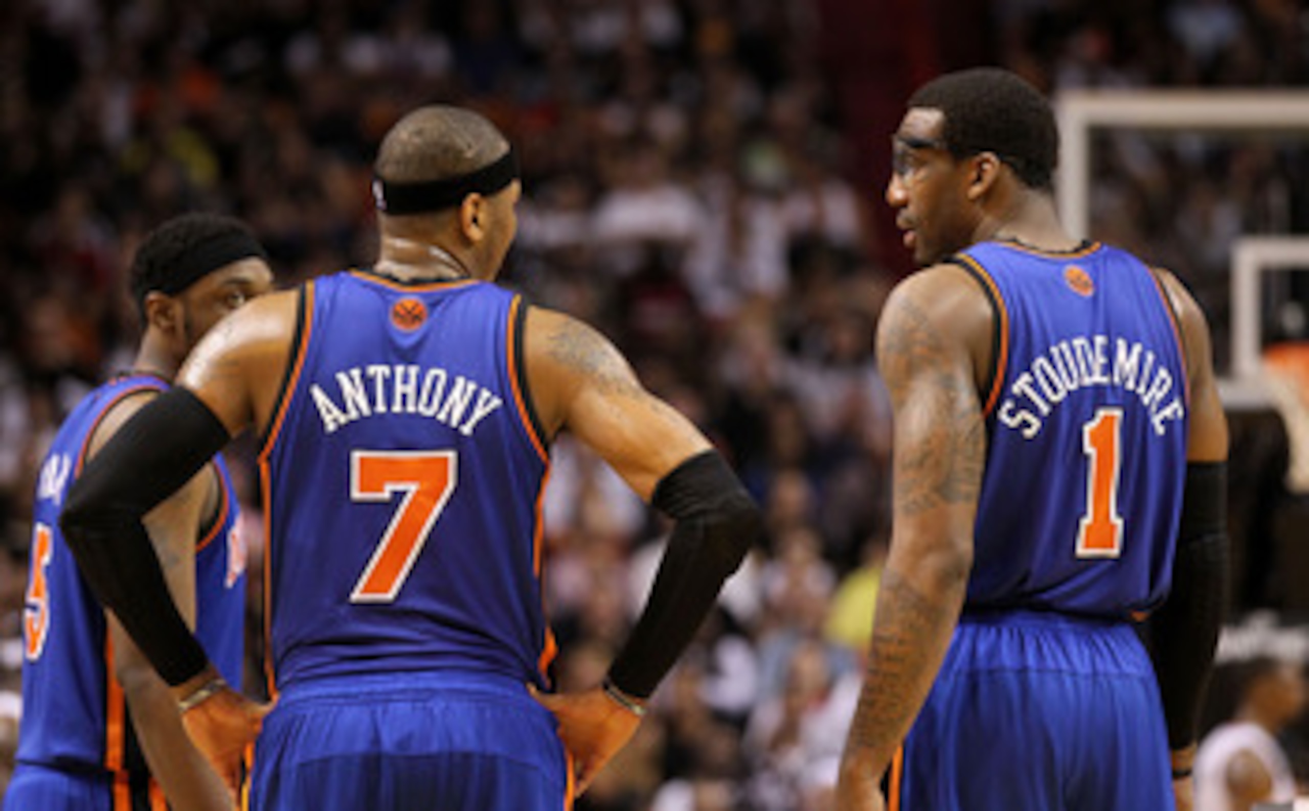 MIAMI, FL - FEBRUARY 27:  Carmelo Anthony #7 and Amar'e Stoudemire #1 of the New York Knicks talk during a game against the the Miami Heat at American Airlines Arena on February 27, 2011 in Miami, Florida. NOTE TO USER: User expressly acknowledges and agr