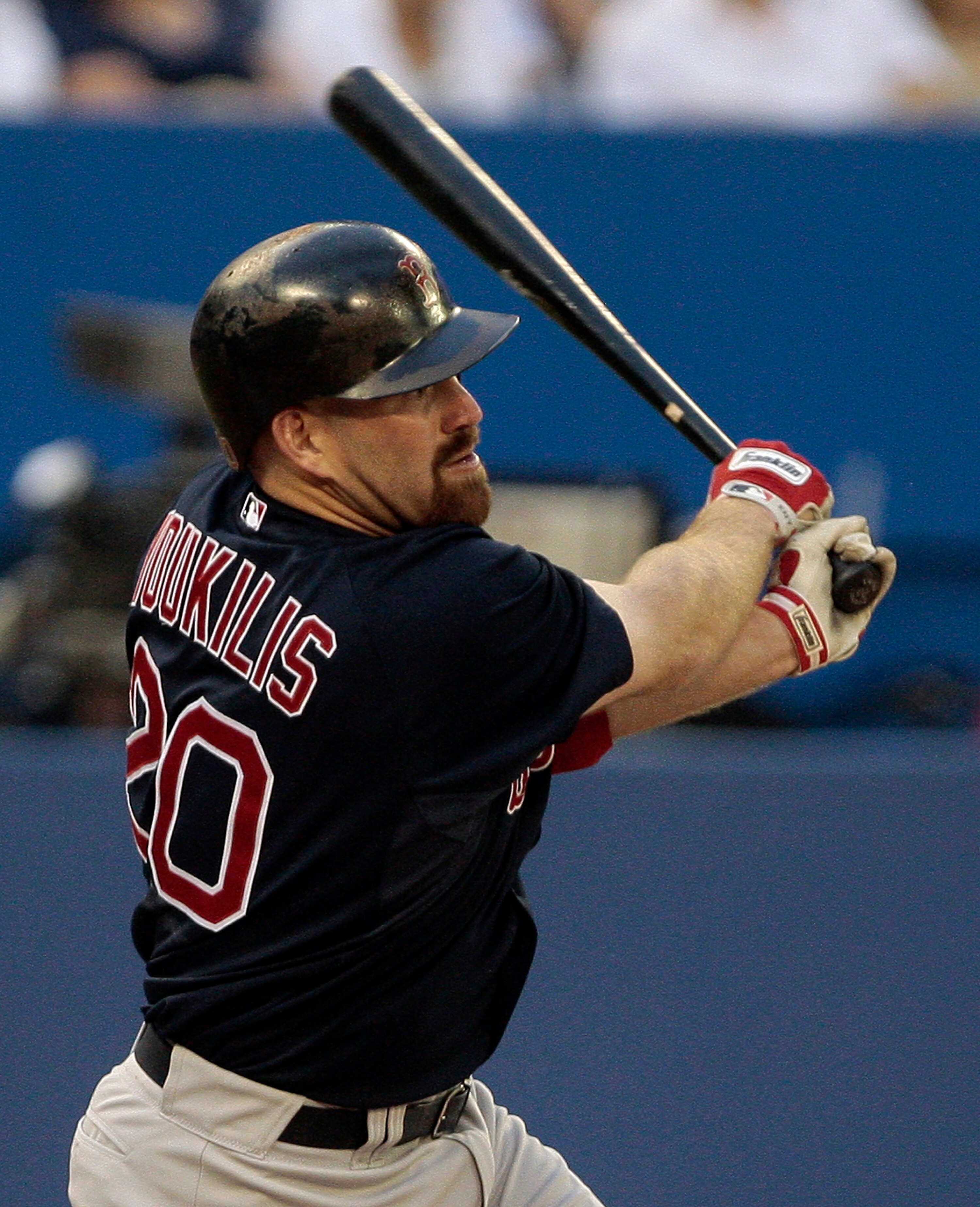 TORONTO, CANADA - JUNE 10:  Kevin Youkilis #20 of the Boston Red Sox hits during MLB action against the Toronto Blue Jays at The Rogers Centre June 10, 2011 in Toronto, Ontario, Canada. (Photo by Abelimages/Getty Images)