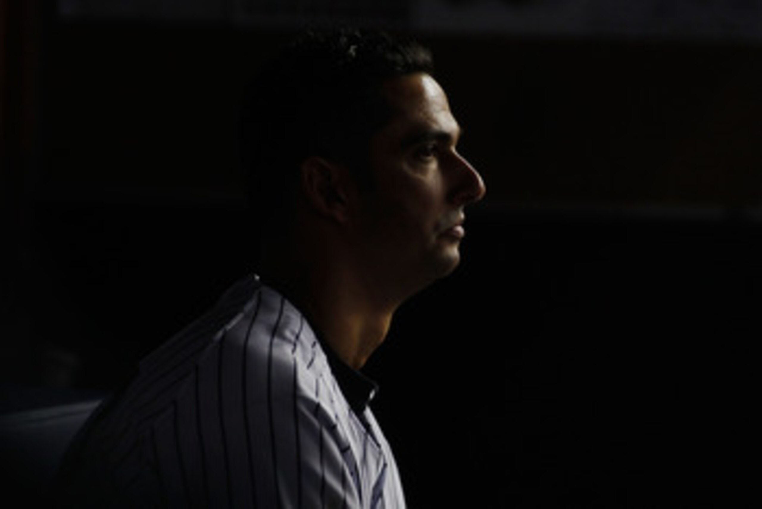 NEW YORK - MAY 20:  Jorge Posada #20 of the New York Yankees sits on the bench during the game against the New York Metson May 20, 2011 at Yankee Stadium in the Bronx borough of New York City. Mets defeat the Yankees 2-1.  (Photo by Mike Stobe/Getty Image