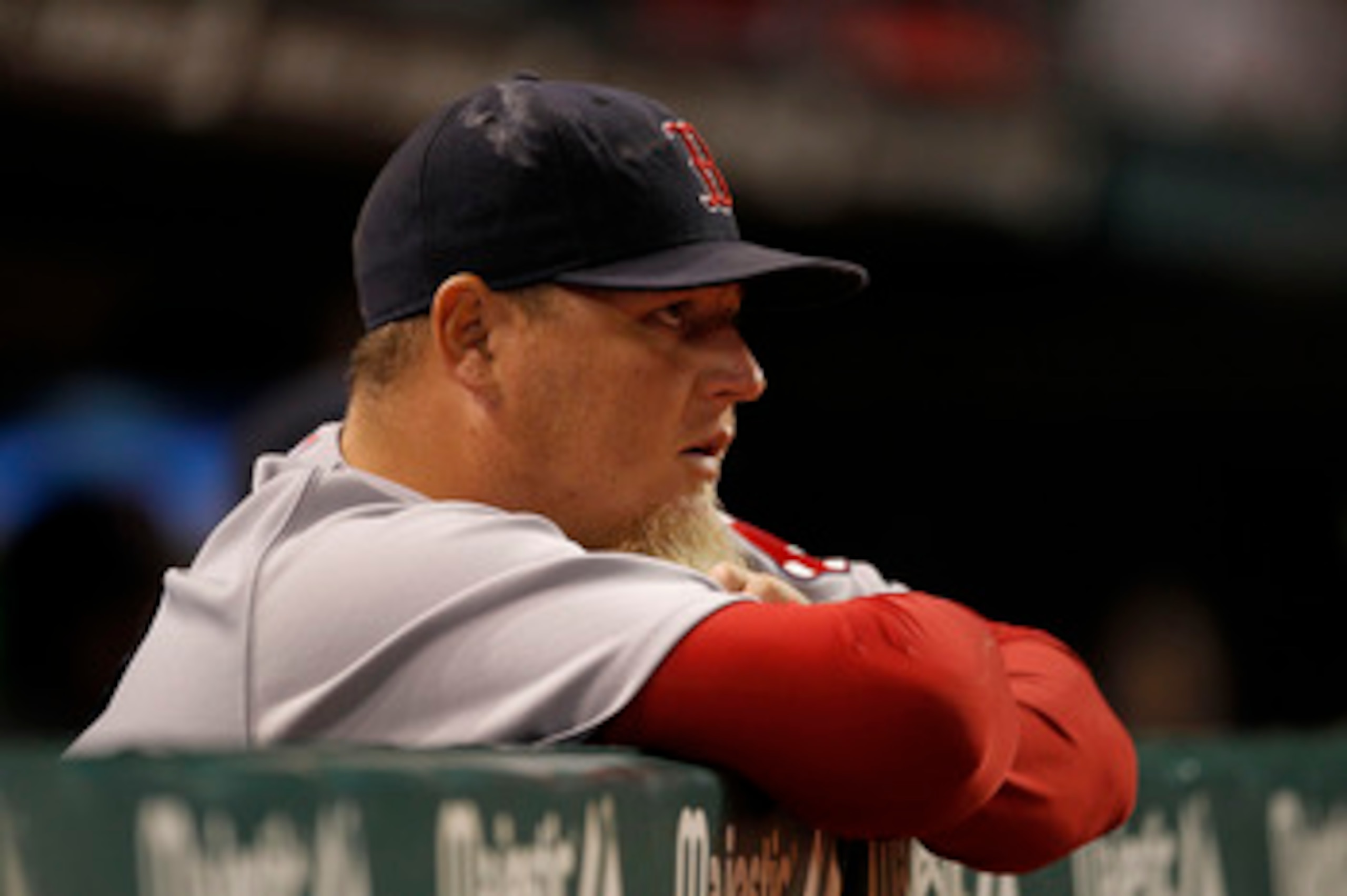 CLEVELAND - APRIL 05: Bobby Jenks #52 of the Boston Red Sox watches the action during the game against the Cleveland Indians at Progressive Field on April 5, 2011 in Cleveland, Ohio. The Indians defeated the Red Sox 3-1.  (Photo by Leon Halip/Getty Images