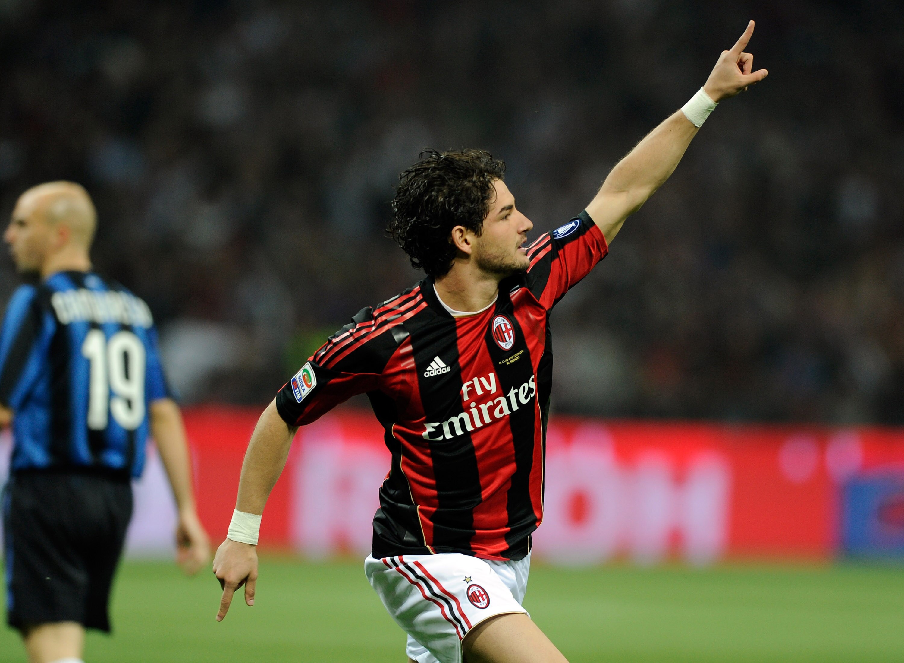 MILAN, ITALY - APRIL 02:  Alexandre Pato of AC Milan celebrates scoring the first goal during the Serie A match between AC Milan and FC Internazionale Milano at Stadio Giuseppe Meazza on April 2, 2011 in Milan, Italy.  (Photo by Claudio Villa/Getty Images