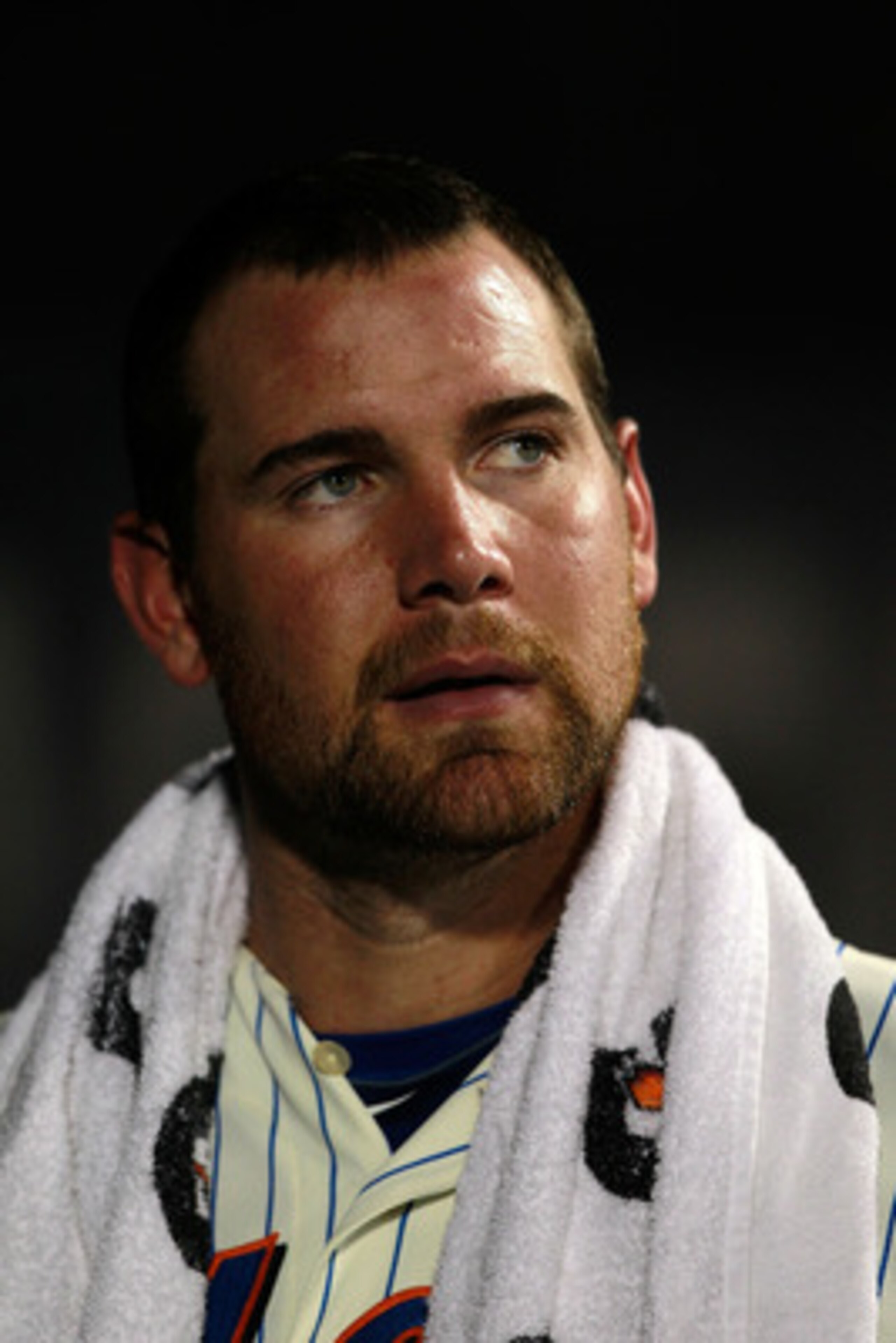 NEW YORK, NY - MAY 28: Mike Pelfrey #34 of the New York Mets looks on from the dugout in the eighth inning against the Philadelphia Phillies at Citi Field on May 28, 2011 in the Flushing neighborhood of the Queens borough of New York City. (Photo by Chris