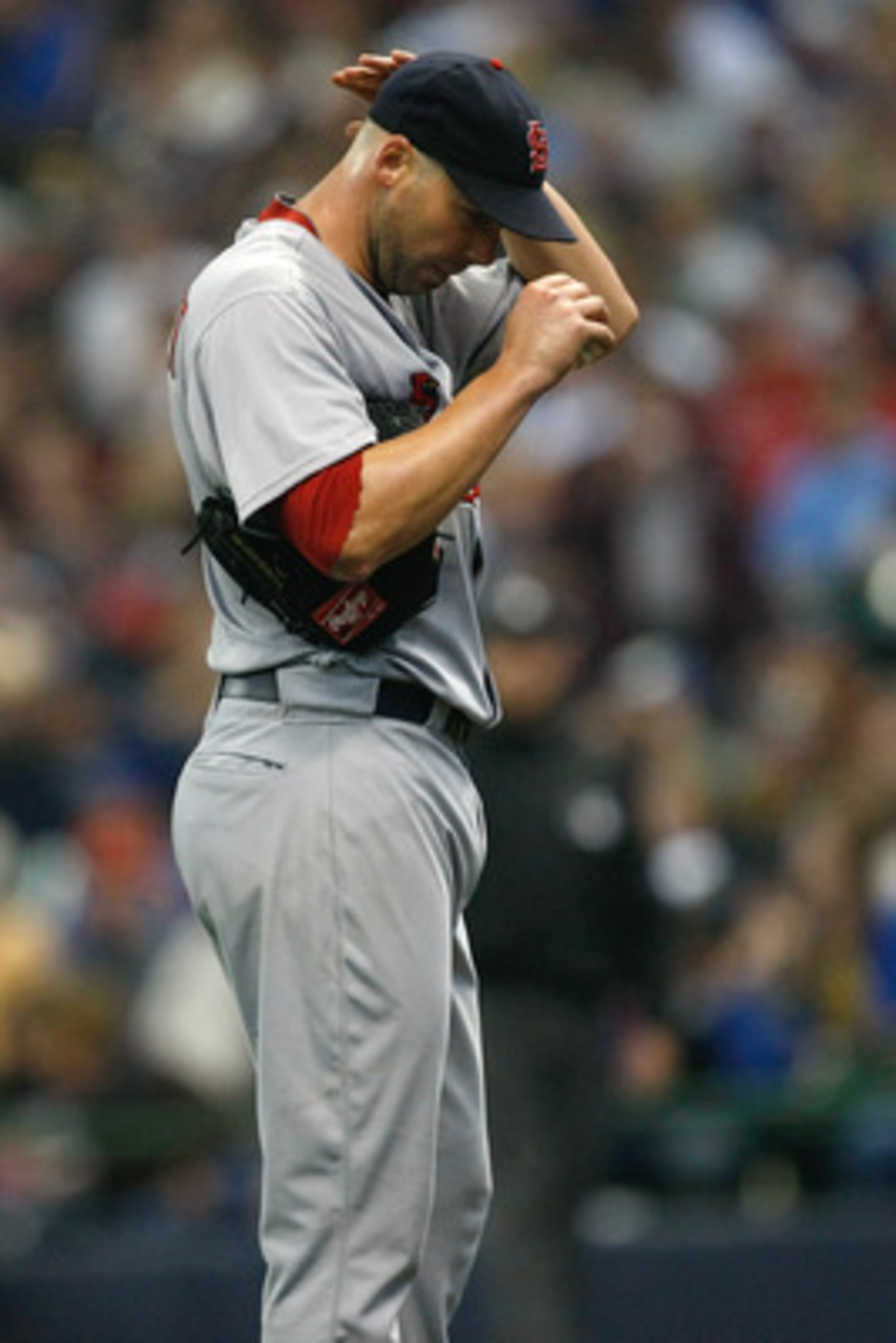 MILWAUKEE, WI - JUNE 11: Chris Carpenter #29 of the St. Louis Cardinals reacts against the Milwaukee Brewers at Miller Park on June 11, 2011 in Milwaukee, Wisconsin. (Photo by Scott Boehm/Getty Images)