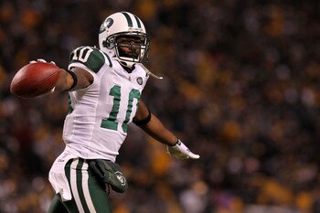 PITTSBURGH, PA - JANUARY 23:  Santonio Holmes #10 of the New York Jets celebrates after he scored a third quarter touchdown against the Pittsburgh Steelers during the 2011 AFC Championship game at Heinz Field on January 23, 2011 in Pittsburgh, Pennsylvani
