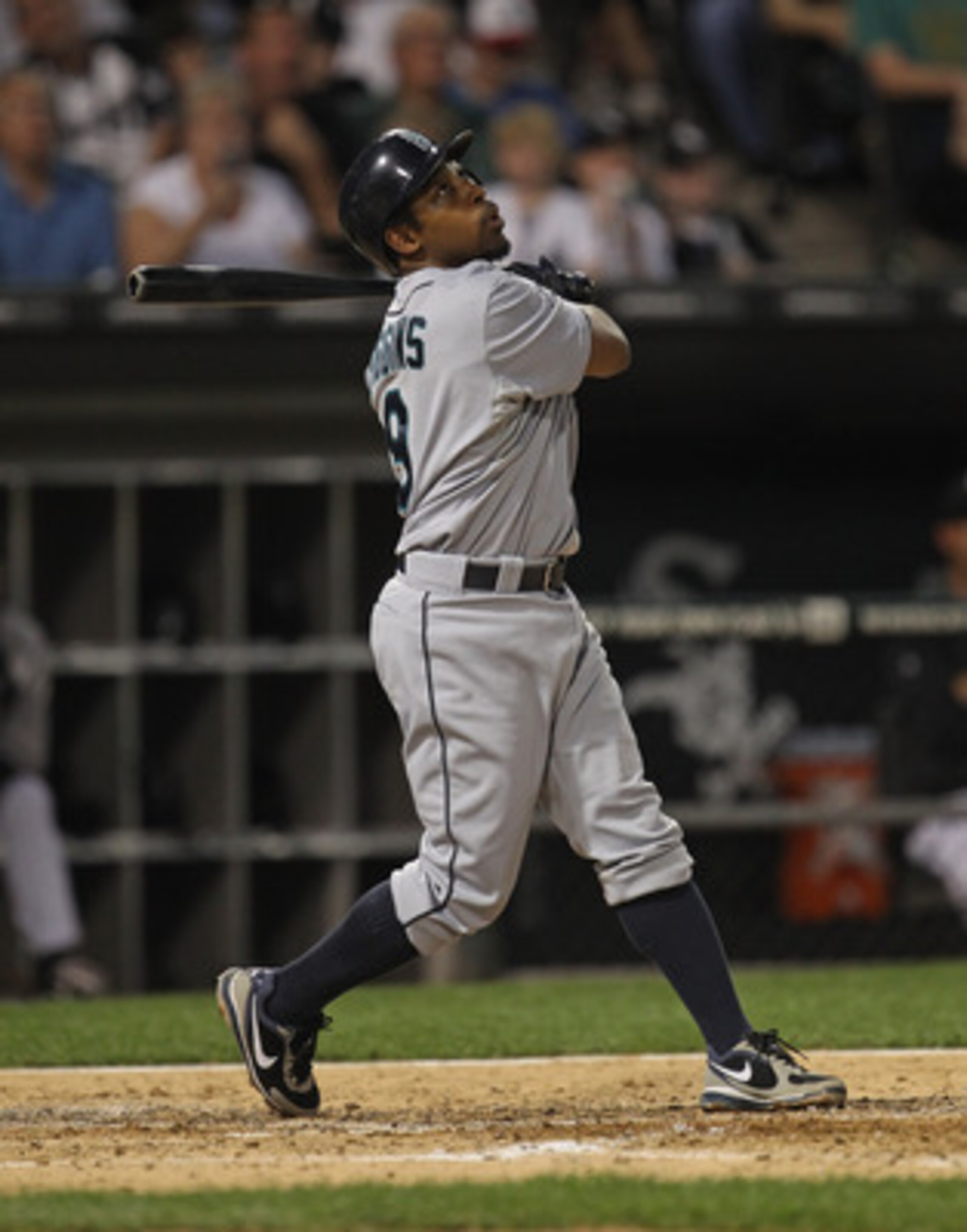 CHICAGO, IL - JUNE 06:  Chone Figgins #9 of the Seattle Mariners hits the ball against the Chicago White Sox at U.S. Cellular Field on June 6, 2011 in Chicago, Illinois. The White Sox defeated the Mariners 3-1.  (Photo by Jonathan Daniel/Getty Images)