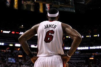 MIAMI, FL - JUNE 12:  LeBron James #6 of the Miami Heat stands on court against the Dallas Mavericks in Game Six of the 2011 NBA Finals at American Airlines Arena on June 12, 2011 in Miami, Florida. NOTE TO USER: User expressly acknowledges and agrees tha