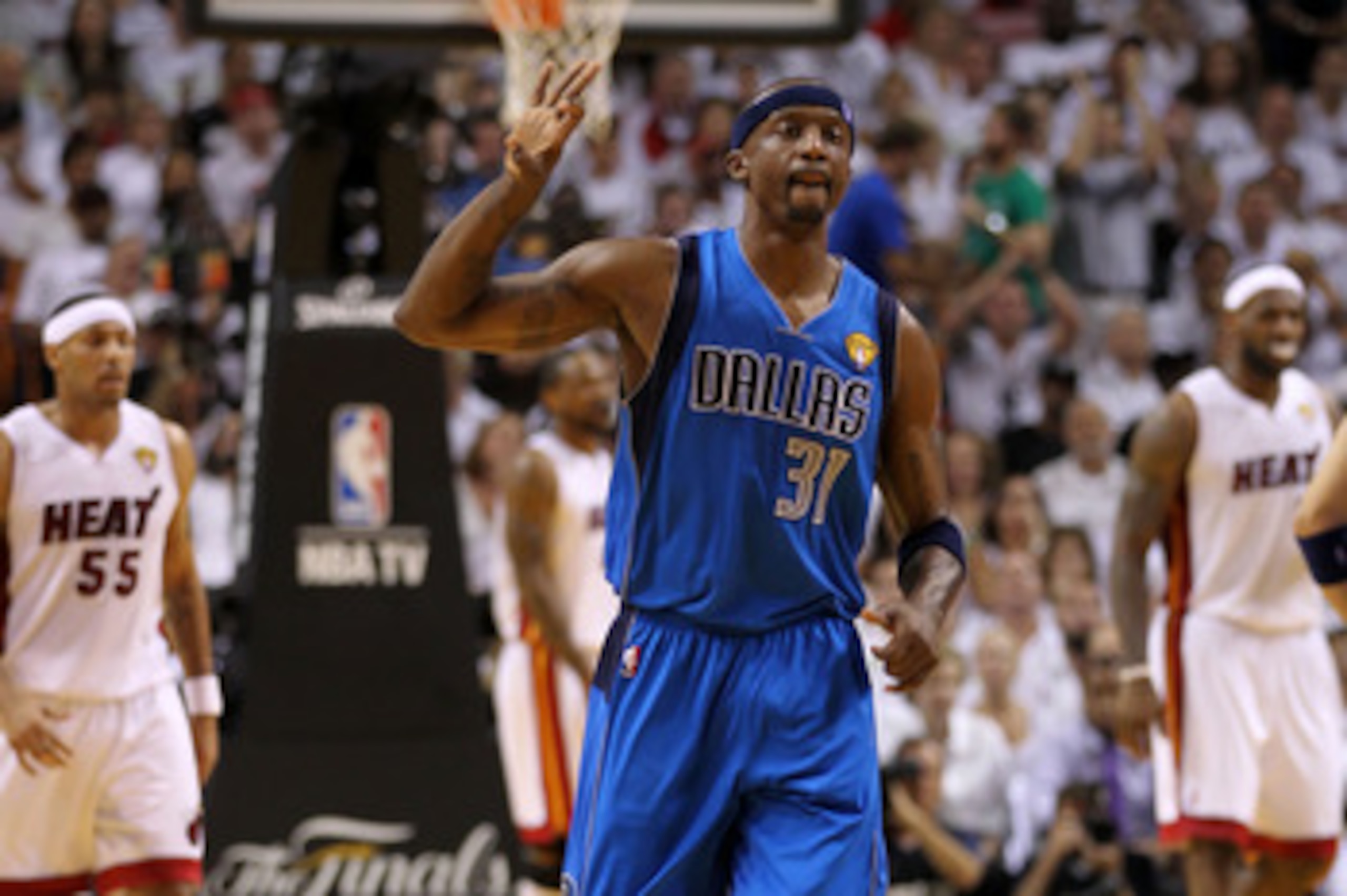 MIAMI, FL - JUNE 12:  Jason Terry #31 of the Dallas Mavericks gestures on court after he made a 3-point shot in the second quarter against Eddie House #55 (L) and LeBron James #6 of the Miami Heat in Game Six of the 2011 NBA Finals at American Airlines Ar
