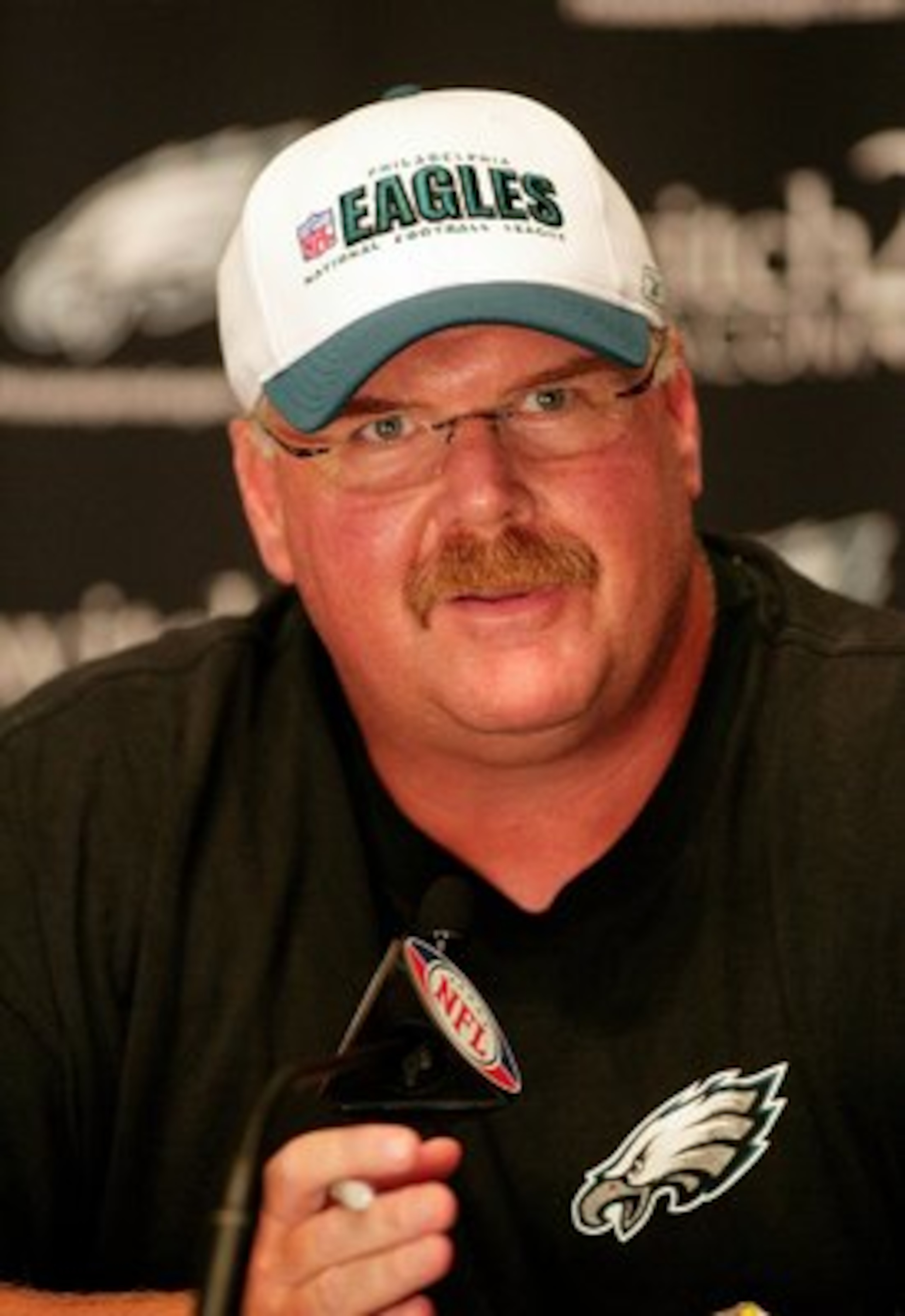 PHILADELPHIA - AUGUST 15:  Head coach Andy Reid of the Philadelphia Eagles speaks at a press conference regarding Michael Vick at the NovaCare Complex on August 15, 2009 in Philadelphia, Pennsylvania.  (Photo by Len Redkoles/Getty Images)
