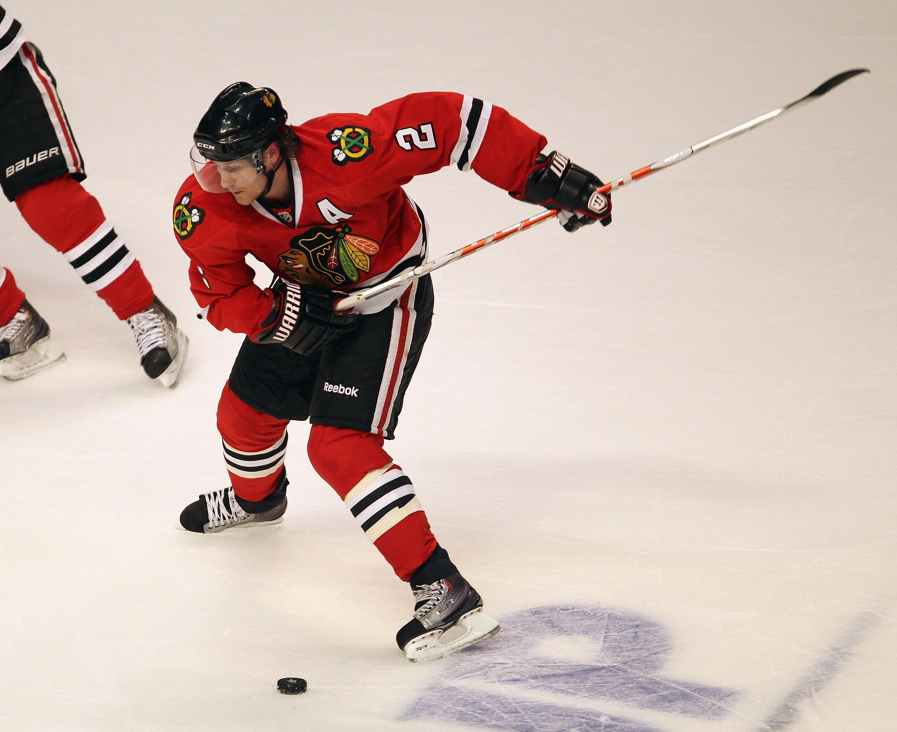 CHICAGO, IL - APRIL 19: Duncan Keith #2 of the Chicago Blackhawks shoots the puck against the Vancouver Canucks in Game Four of the Western Conference Quarterfinals during the 2011 NHL Stanley Cup Playoffs at the United Center on April 19, 2011 in Chicago