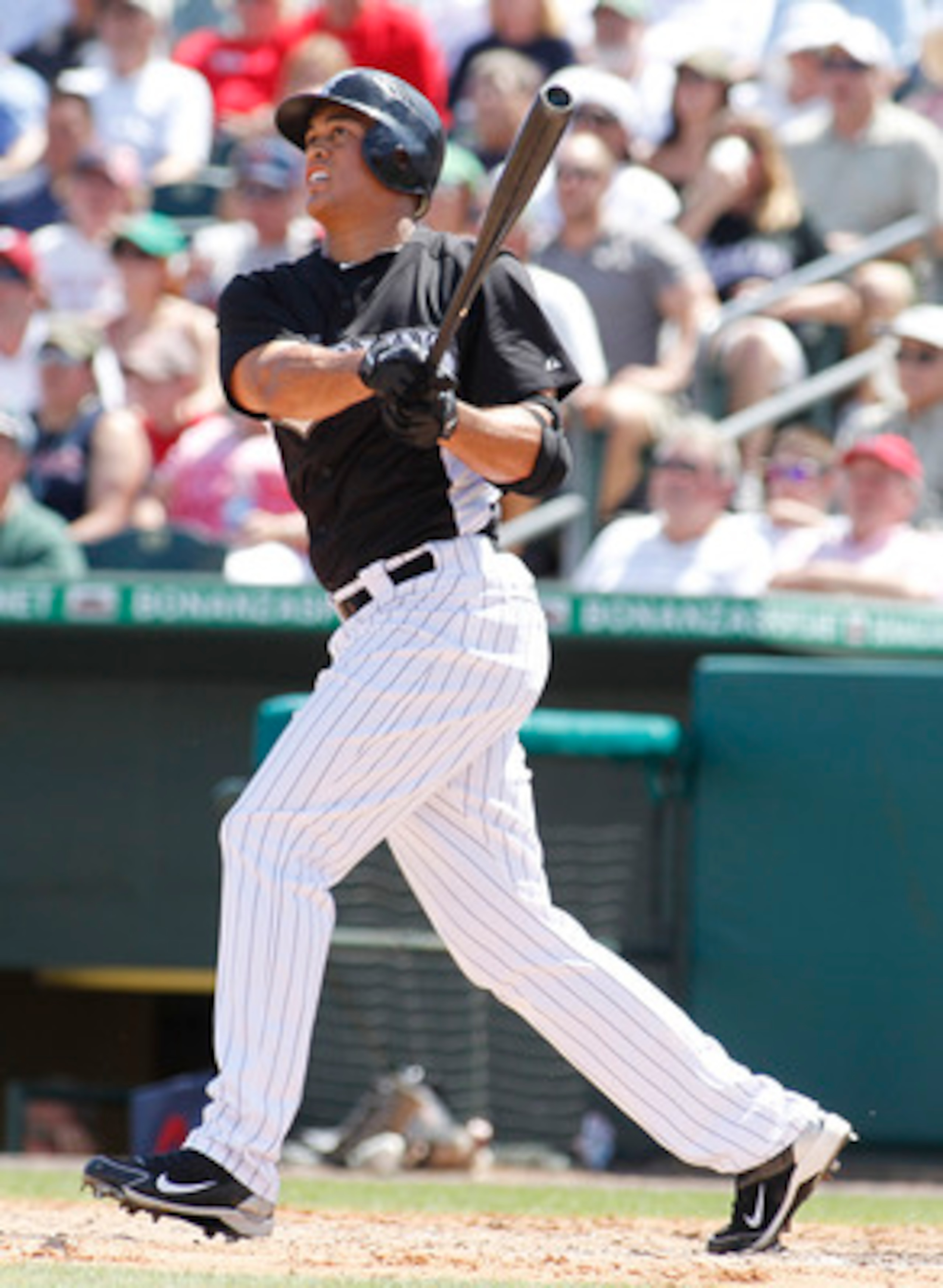 JUPITER, FL - MARCH 24: Mike Stanton #27 of the Florida Marlins watches as the ball he hit clears the left field fence for a three run home run against the Boston Red Sox in the fourth inning at Roger Dean Stadium on March 24, 2011 in Jupiter, Florida. (P