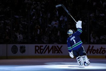 VANCOUVER, BC - JUNE 01:  Roberto Luongo #1 of the Vancouver Canucks celebrates after defeating the Boston Bruins in game one of the 2011 NHL Stanley Cup Finals at Rogers Arena on June 1, 2011 in Vancouver, Canada.  (Photo by Harry How/Getty Images)