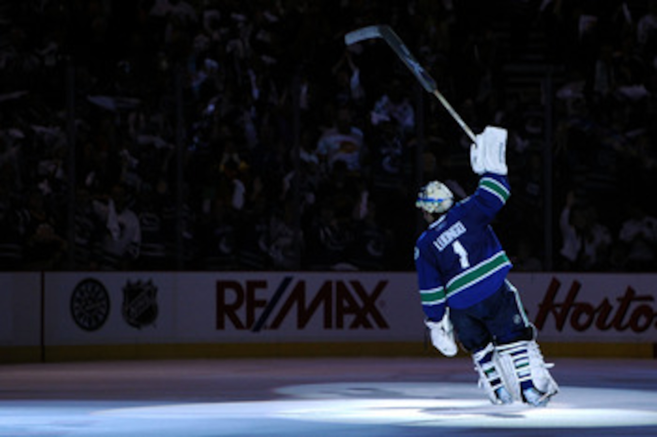 VANCOUVER, BC - JUNE 01:  Roberto Luongo #1 of the Vancouver Canucks celebrates after defeating the Boston Bruins in game one of the 2011 NHL Stanley Cup Finals at Rogers Arena on June 1, 2011 in Vancouver, Canada.  (Photo by Harry How/Getty Images)