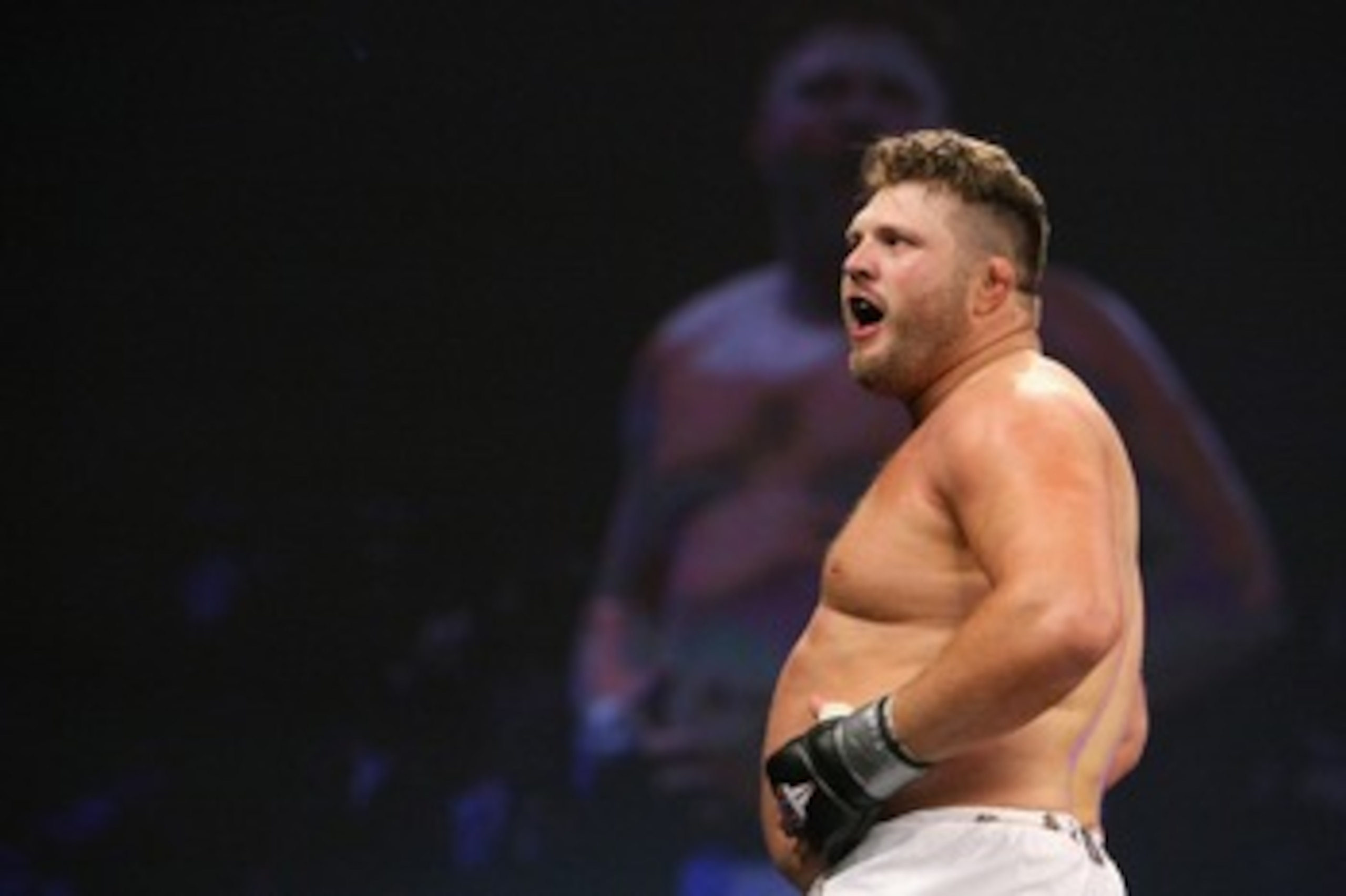 UNCASVILLE, CT - MAY 16: Roy Nelson (White Trunks) of the Lions Den celebrates after beating Brad Imes MilesTech Fighting System during their bout presented by the International Fighting League at the Mohegan Sun Arena May 16, 2008 in Uncasville, Connecti