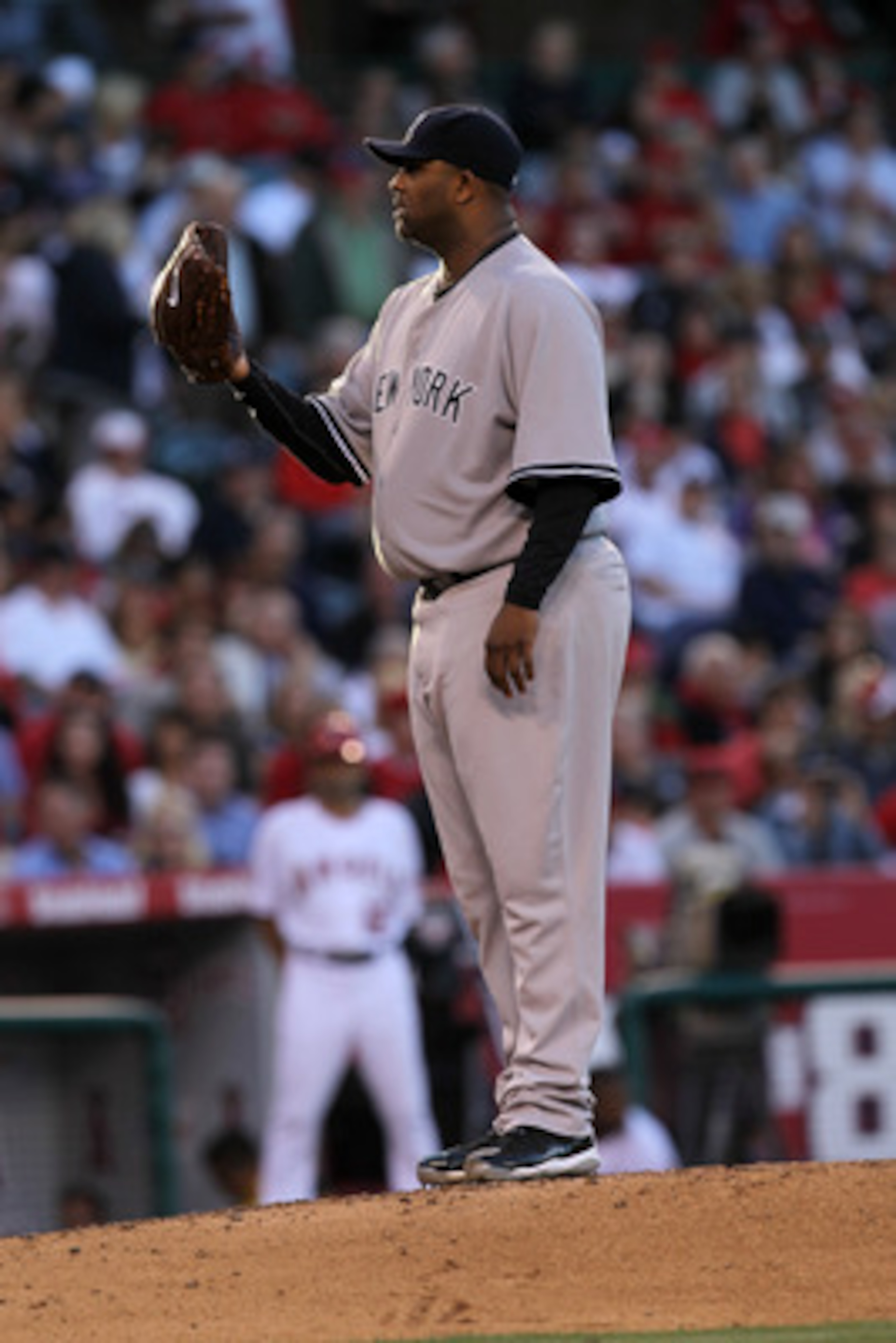 ANAHEIM, CA - JUNE 04:  CC Sabathia #55 of the New York Yankees pitches against the Los Angeles Angels of Anaheim on June 4, 2011 at Angel Stadium in Anaheim, California.  The Yankees won 3-2.  (Photo by Stephen Dunn/Getty Images)