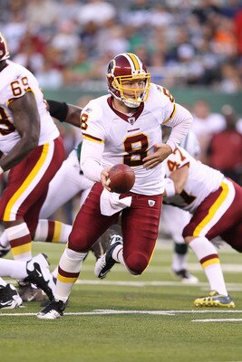 EAST RUTHERFORD, NJ - AUGUST 27:  Rex Grossman #8  of the Washington Redskins in action against  the New York Jets during their preseason game on August 27, 2010 at the New Meadowlands Stadium  in East Rutherford, New Jersey.  (Photo by Al Bello/Getty Ima
