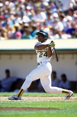 OAKLAND, CA - CIRCA 1990:  Rickey Henderson #24 of the Oakland Athletics bats during an MLB game at Oakland-Alameda Coliseum circa 1990 in Oakland, California. (Photo by Otto Greule Jr./Getty Images)