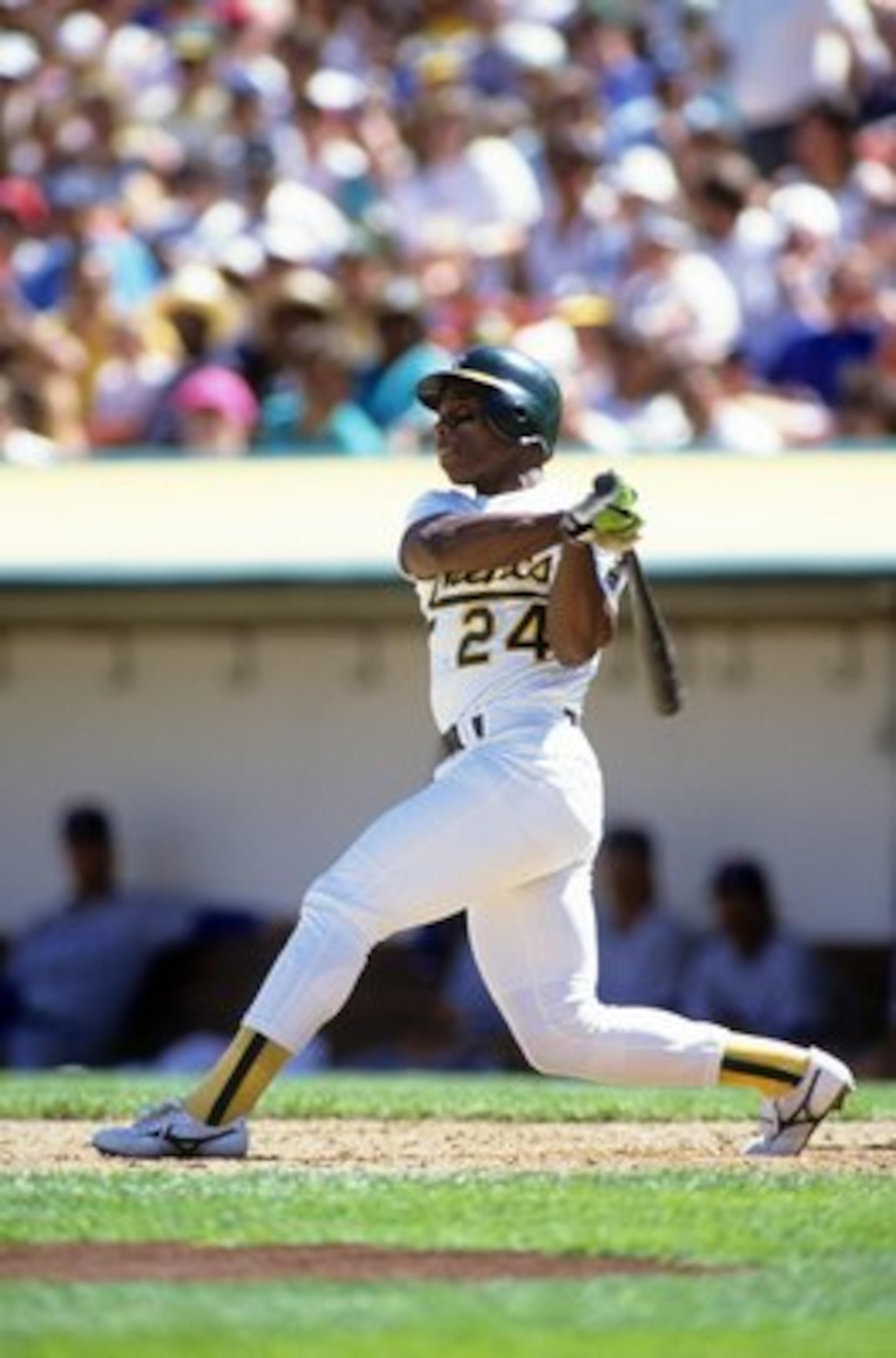 OAKLAND, CA - CIRCA 1990:  Rickey Henderson #24 of the Oakland Athletics bats during an MLB game at Oakland-Alameda Coliseum circa 1990 in Oakland, California. (Photo by Otto Greule Jr./Getty Images)