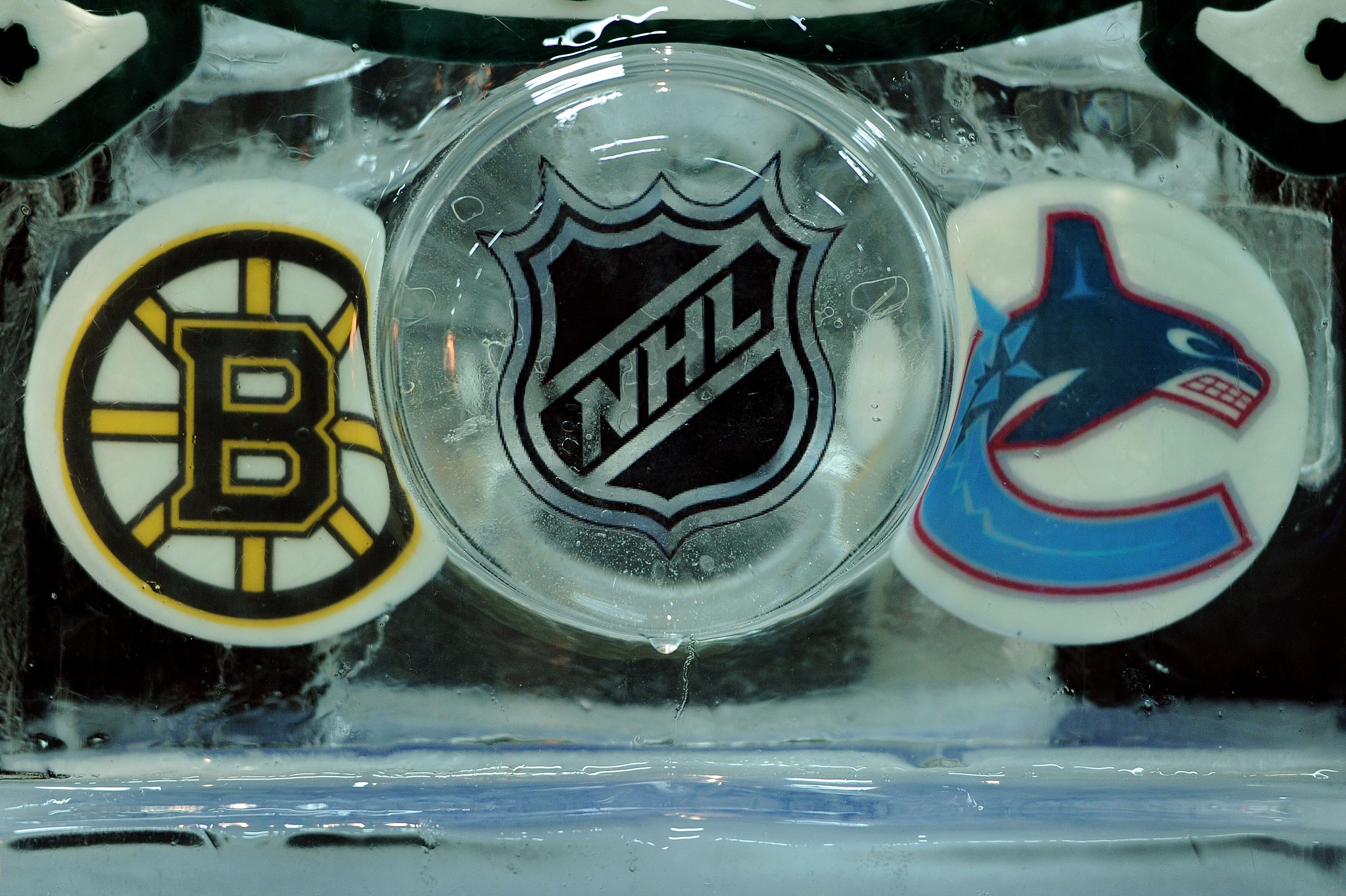 BOSTON, MA - JUNE 06:  The NHL's, Vancouver Canucks' and Boston Bruins' logos are seen frozen into an ice sculpture during Game Three of the 2011 NHL Stanley Cup Final at TD Garden on June 6, 2011 in Boston, Massachusetts.  (Photo by Harry How/Getty Image