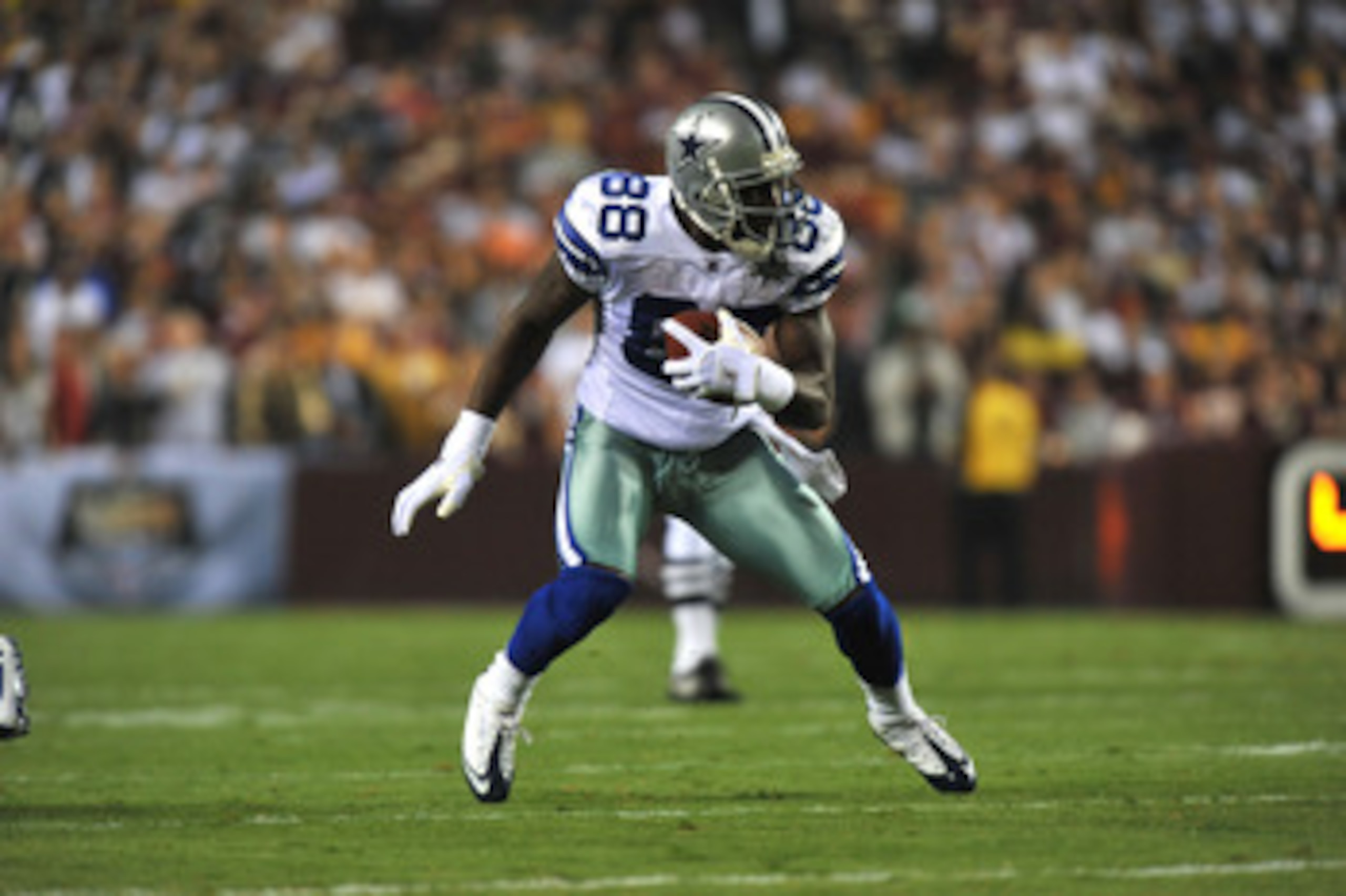 LANDOVER - SEPTEMBER 12:  Dez Bryant #88 of the Dallas Cowboys runs the ball during the NFL season opener against the Washington Redskins at FedExField on September 12, 2010 in Landover, Maryland.  (Photo by Larry French/Getty Images)