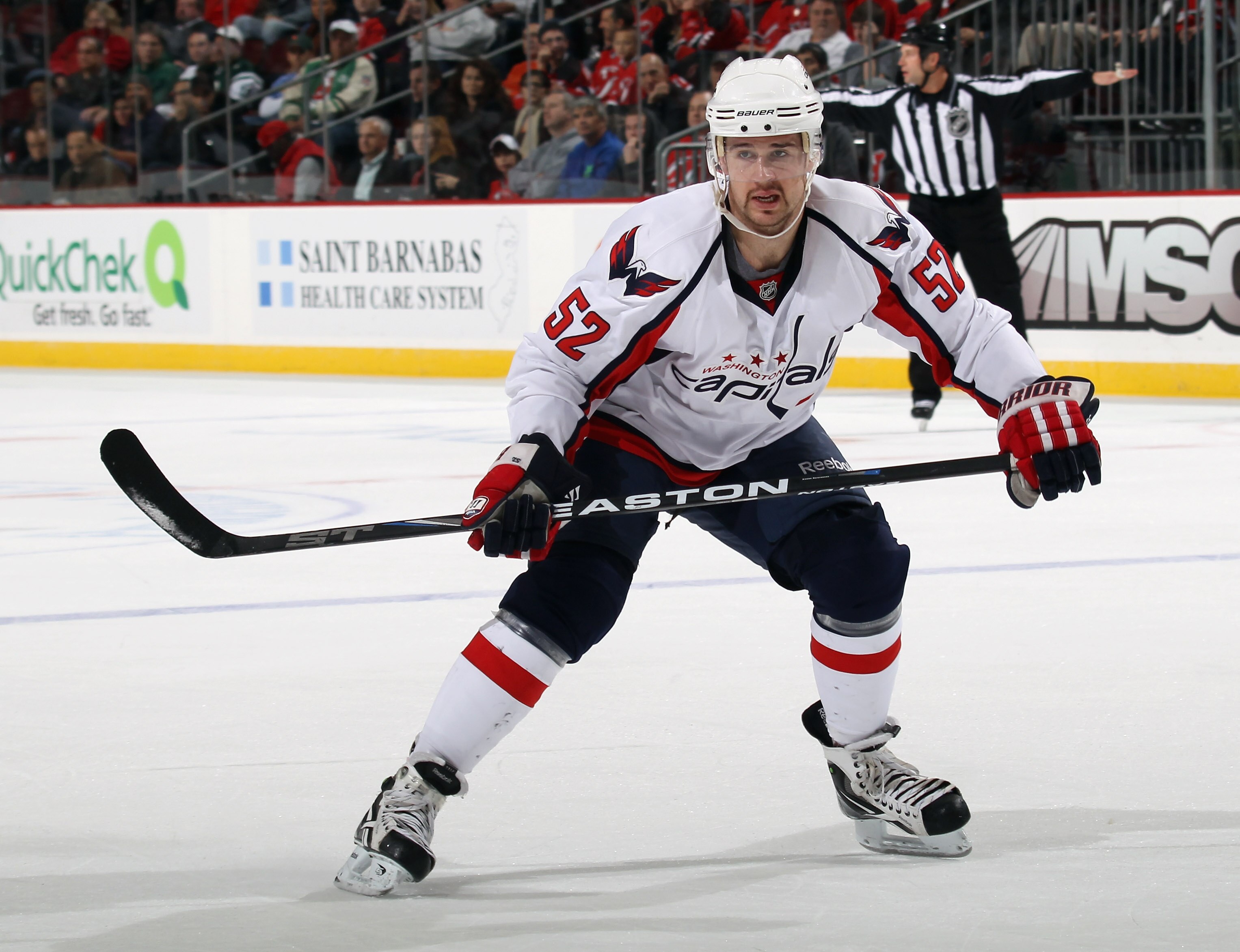 NEWARK, NJ - NOVEMBER 22:  Mike Green #52 of the Washington Capitals skates against the New Jersey Devils at the Prudential Center on November 22, 2010 in Newark, New Jersey. The Devils defeated the Capitals 5-0.  (Photo by Bruce Bennett/Getty Images)