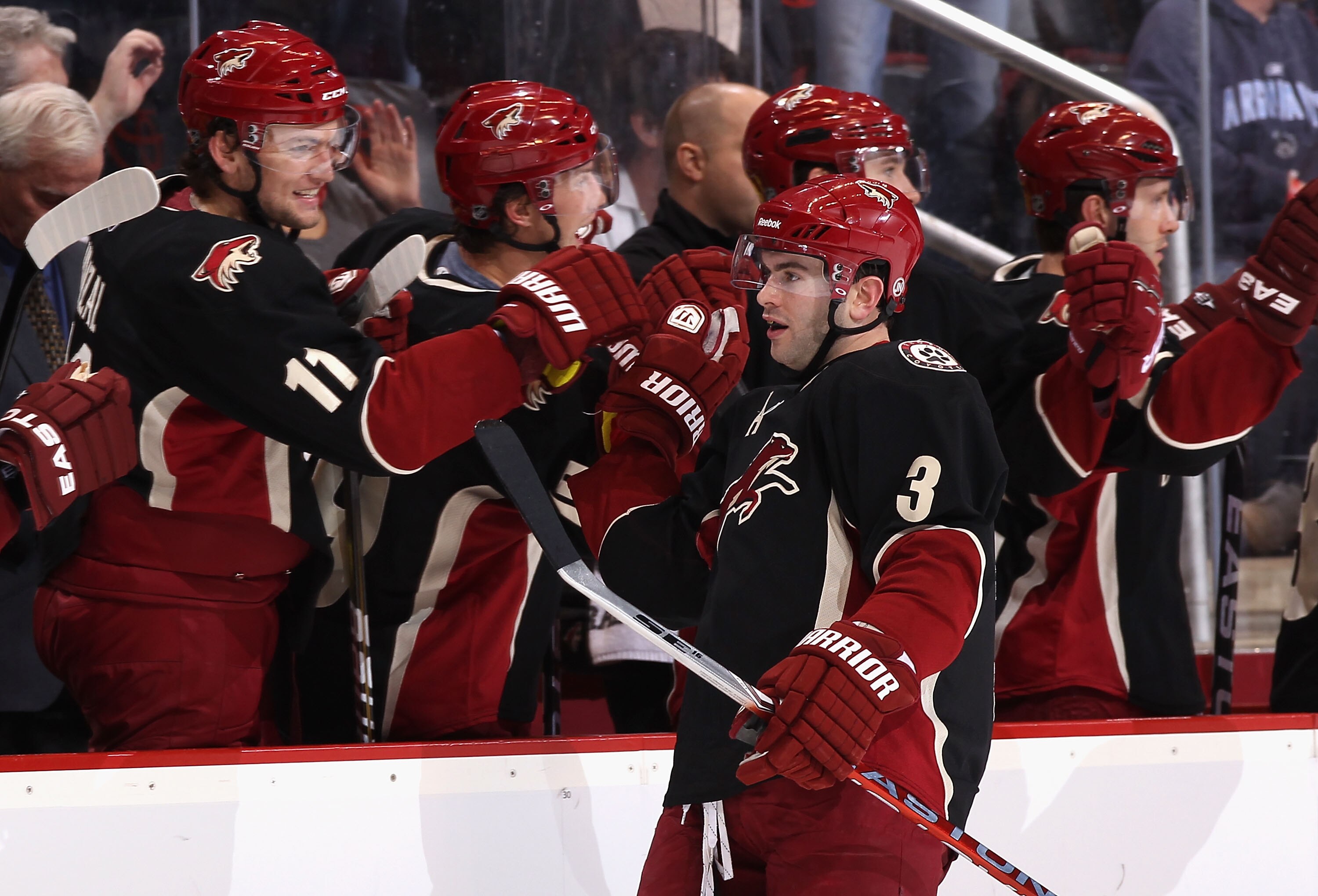 GLENDALE, AZ - JANUARY 13:  Keith Yandle #3 of the Phoenix Coyotes celebrates with teammates after scoring during the NHL game against the Toronto Maple Leafs at Jobing.com Arena on January 13, 2011 in Glendale, Arizona. The Coyotes defeated the Maple Lea