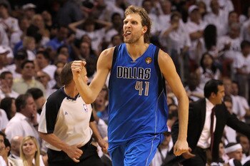 MIAMI, FL - JUNE 12:  Dirk Nowitzki #41 of the Dallas Mavericks reacts after making a jump shot in the fourth quarter while taking on the Miami Heat in Game Six of the 2011 NBA Finals at American Airlines Arena on June 12, 2011 in Miami, Florida. NOTE TO