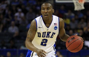 CHARLOTTE, NC - MARCH 20:  Nolan Smith #2 of the Duke Blue Devils moves the ball while taking on the Michigan Wolverines during the third round of the 2011 NCAA men's basketball tournament at Time Warner Cable Arena on March 20, 2011 in Charlotte, North C