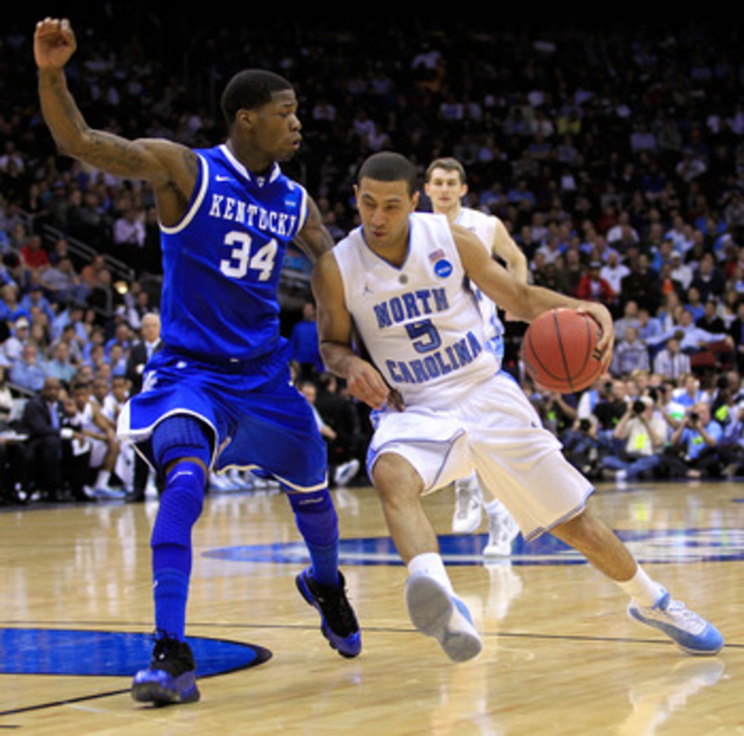 NEWARK, NJ - MARCH 27:  Kendall Marshall #5 of the North Carolina Tar Heels in action against DeAndre Liggins #34 of the Kentucky Wildcats during the east regional final of the 2011 NCAA men's basketball tournament at Prudential Center on March 27, 2011 i