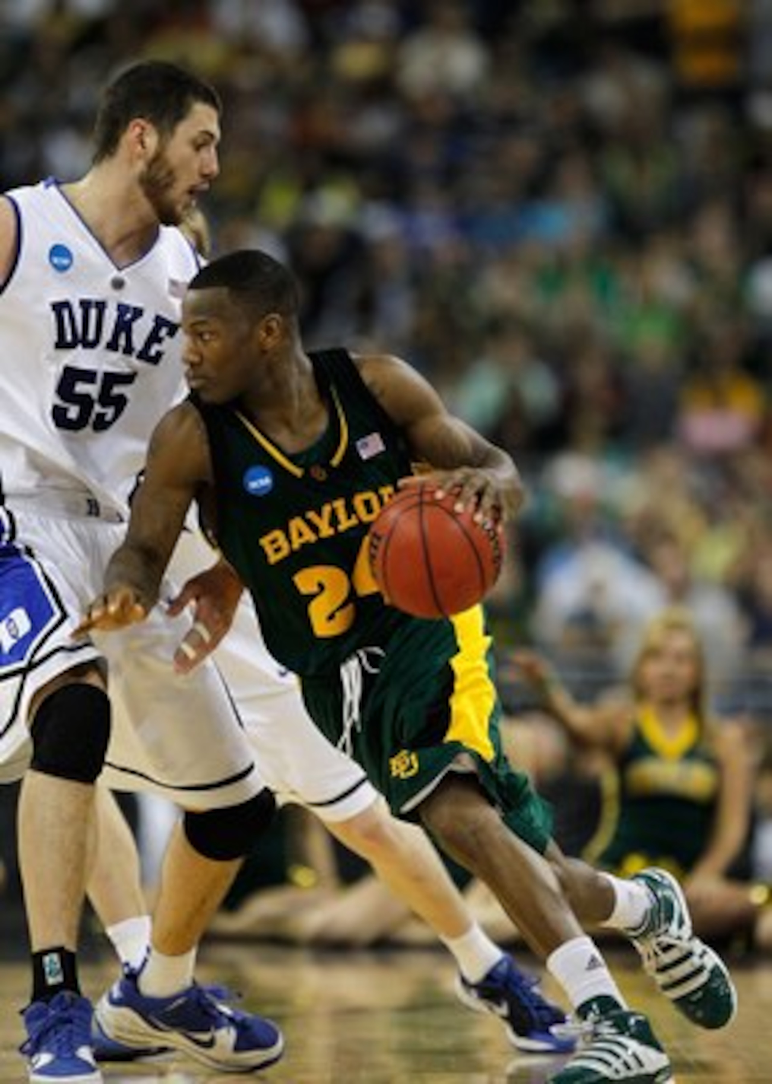 HOUSTON - MARCH 28: LaceDarius Dunn #24 of the Baylor Bears moves against Brian Zoubek #55 of the Duke Blue Devils during the south regional final of the 2010 NCAA men's basketball tournament at Reliant Stadium on March 28, 2010 in Houston, Texas. Duke de