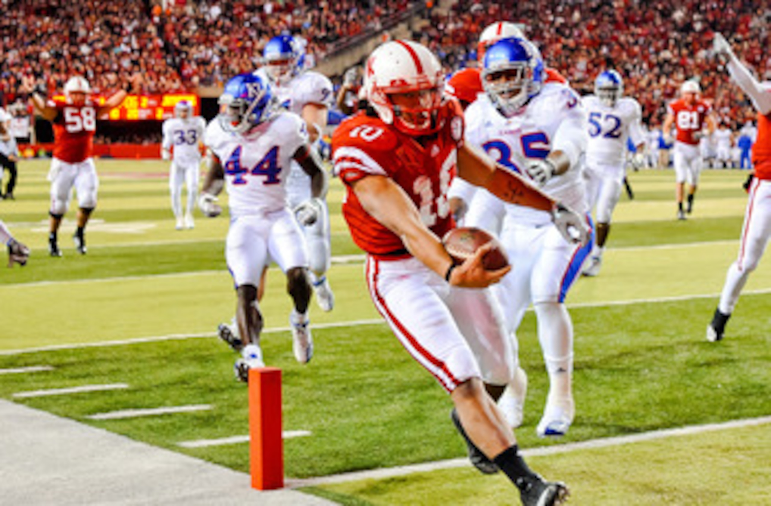 LINCOLN, NE - NOVEMBER 13: Roy Helu Jr. #10 of the Nebraska Cornhuskers runs for the endzone the Kansas Jayhawks during their game at Memorial Stadium on November 13, 2010 in Lincoln, Nebraska. Nebraska Defeated Kansas 20-3. (Photo by Eric Francis/Getty I