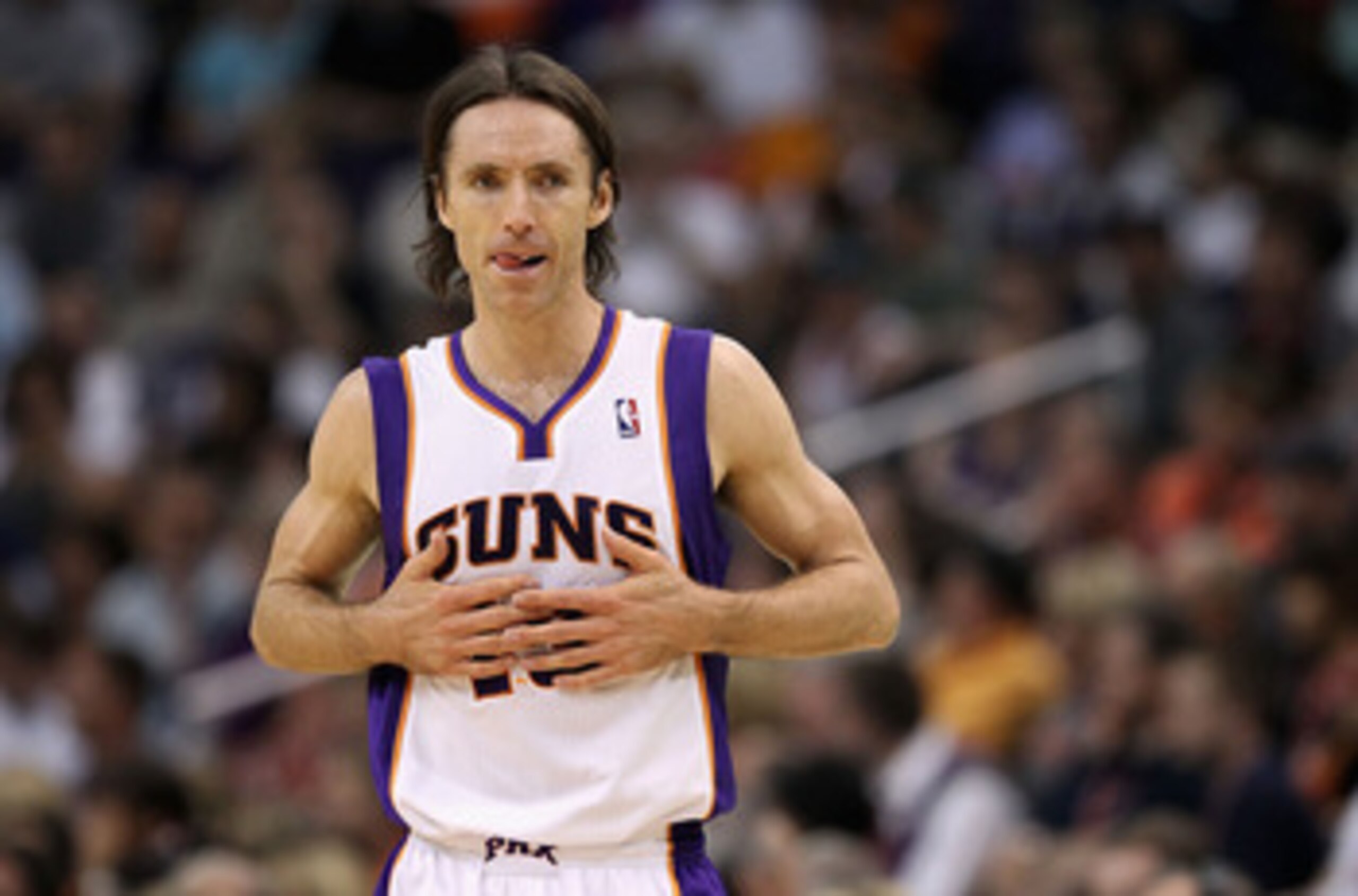 PHOENIX, AZ - MARCH 30:  Steve Nash #13 of the Phoenix Suns in action during the NBA game against the Oklahoma City Thunder at US Airways Center on March 30, 2011 in Phoenix, Arizona. The Thunder defeated the Suns 116-98.  NOTE TO USER: User expressly ack