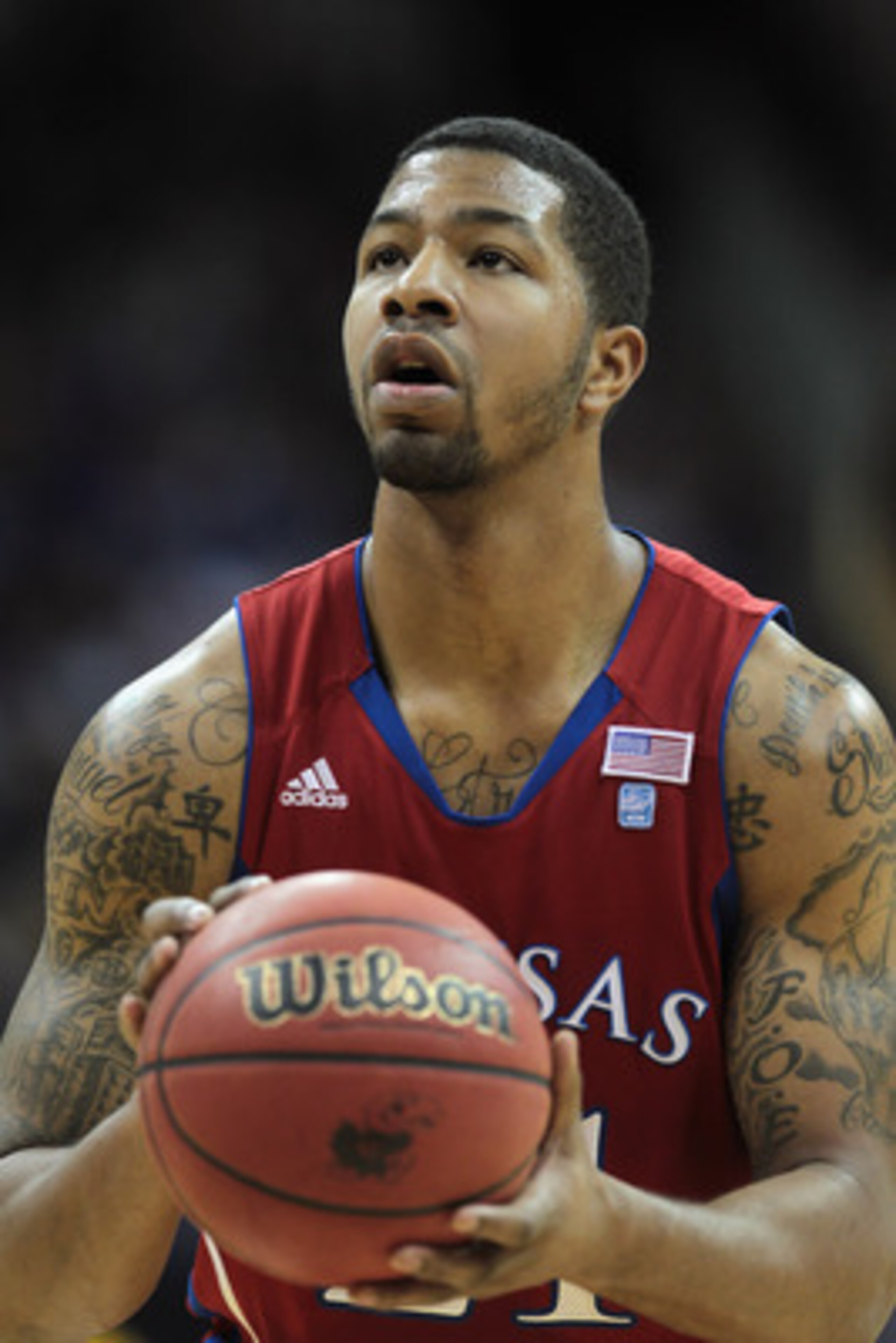 KANSAS CITY, MO - DECEMBER 11:  Markieff Morris #21 of the Kansas Jayhawks in action during the game against the Colorado State Rams on December 11, 2010 at the Sprint Center in Kansas City, Missouri.  (Photo by Jamie Squire/Getty Images)