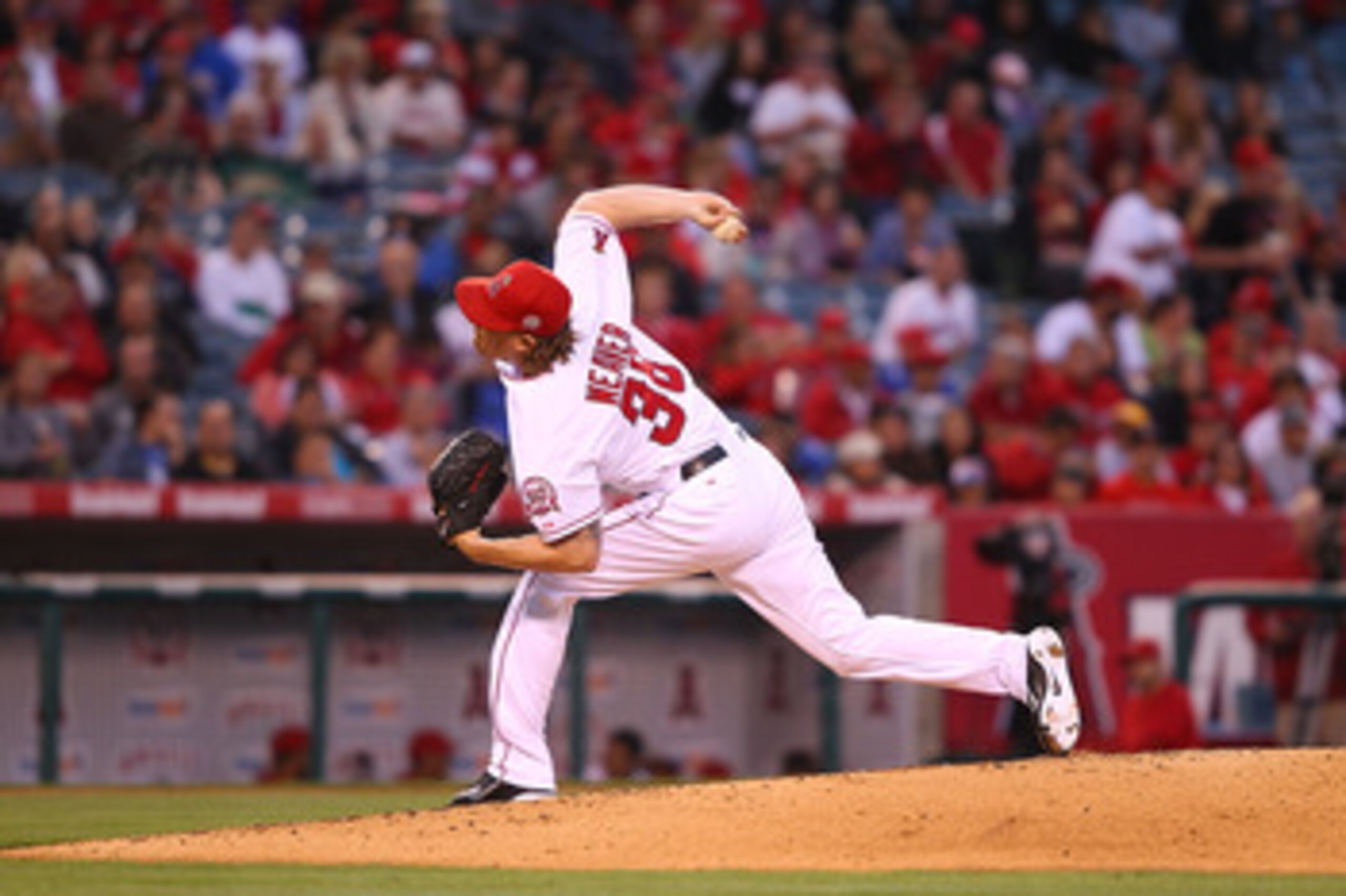 ANAHEIM, CA - MAY 23:  Jered Weaver #36 of the Los Angeles Angels of Anaheim pitches in the second inning against the Oakland Athletics during the game at Angel Stadium of Anaheim on May 23, 2011 in Anaheim, California.  (Photo by Joe Scarnici/Getty Image