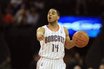 CHARLOTTE, NC - FEBRUARY 14:  D.J. Augustin #14 of the Charlotte Bobcats during their game at Time Warner Cable Arena on February 14, 2011 in Charlotte, North Carolina. NOTE TO USER: User expressly acknowledges and agrees that, by downloading and/or using
