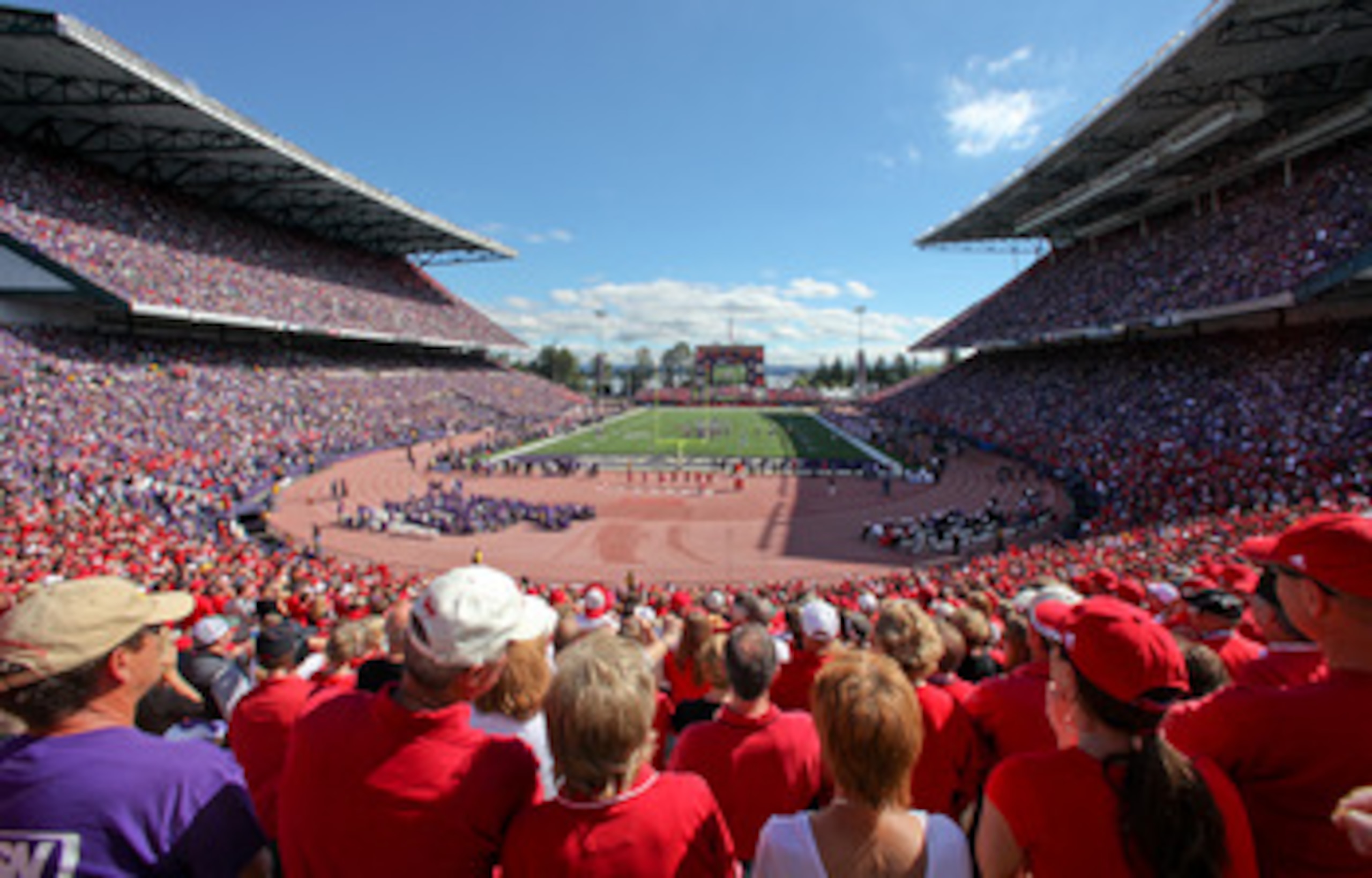 SEATTLE - SEPTEMBER 18: Fans of the Nebraska Cornhuskers watch the game against the Washington Huskies on September 18, 2010 at Husky Stadium in Seattle, Washington. The Cornhuskers defeated the Huskies 56-21.(Photo by Otto Greule Jr/Getty Images)