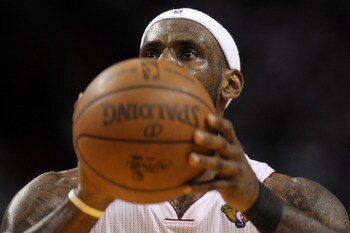 MIAMI, FL - JUNE 12:  LeBron James #6 of the Miami Heat gets set to attempt a free throw against the Dallas Mavericks in Game Six of the 2011 NBA Finals at American Airlines Arena on June 12, 2011 in Miami, Florida. NOTE TO USER: User expressly acknowledg