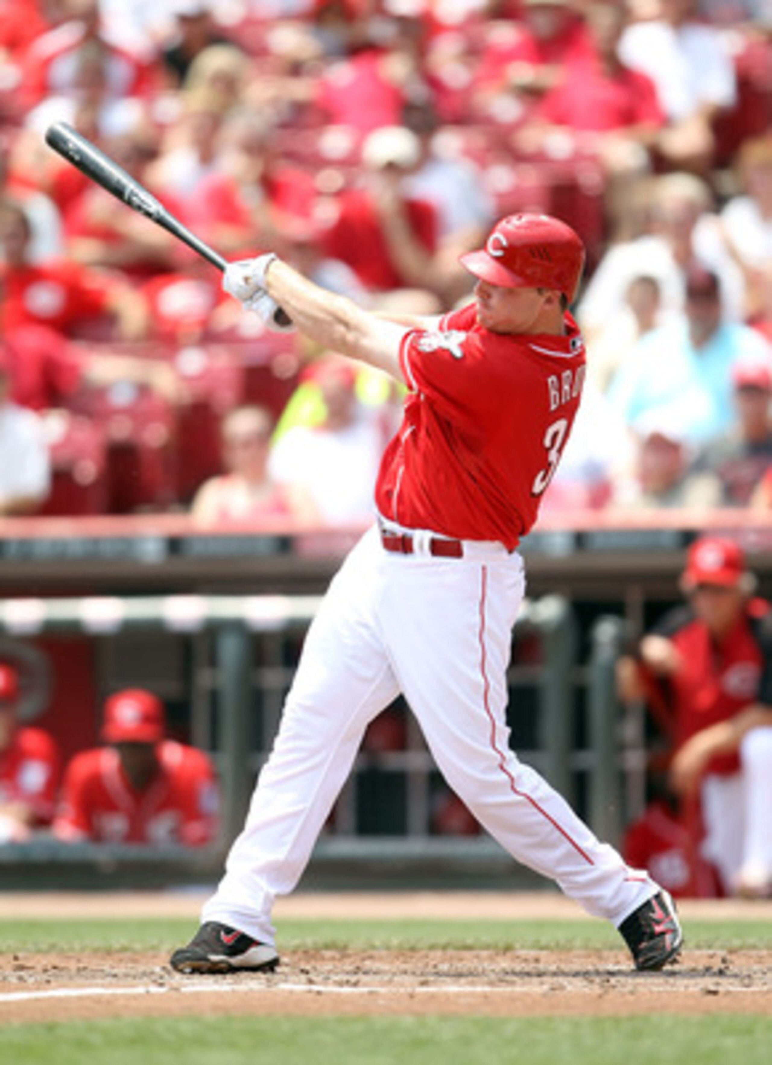 CINCINNATI, OH - JUNE 08:  Jay Bruce #32 of the Cincinnati Reds hits a run scoring single during the game against the Chicago Cubs at Great American Ball Park on June 8, 2011 in Cincinnati, Ohio.  (Photo by Andy Lyons/Getty Images)