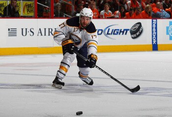 PHILADELPHIA, PA - APRIL 22:  Marc-Andre Gragnani #17 of the Buffalo Sabres controls the puck against the Philadelphia Flyers in Game Five of the Eastern Conference Quarterfinals during the 2011 NHL Stanley Cup Playoffs at Wells Fargo Center on April 22, 