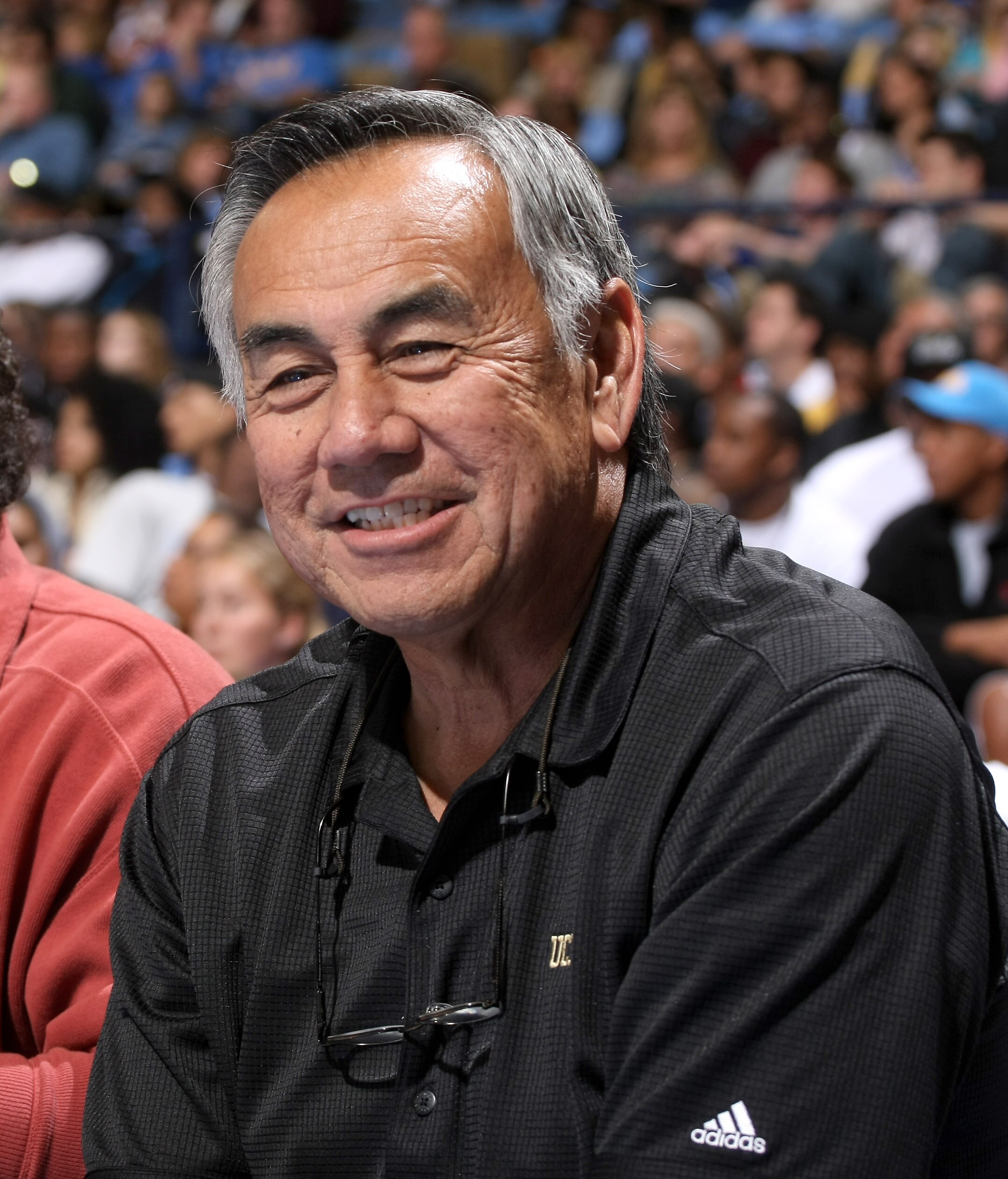 WESTWOOD, CA - JANUARY 16: UCLA football offensive coordinator Norm Chow attends the game between  the USC Trojans and the UCLA Bruins on January 16, 2010 at Pauley Pavillion in Westwood, California.  USC won 67-46.  (Photo by Stephen Dunn/Getty Images)