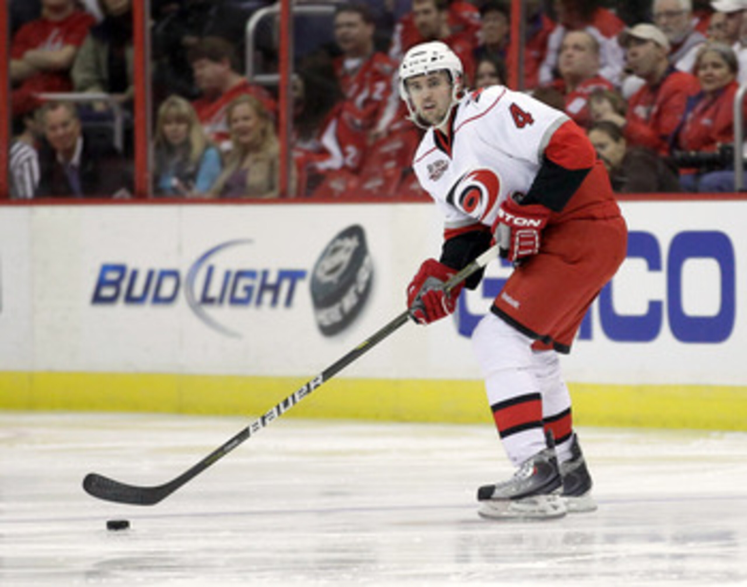 WASHINGTON, DC - MARCH 29:  Jamie McBain #4 of the Carolina Hurricanes skates with the puck against the Washington Capitals at the Verizon Center on March 29, 2011 in Washington, DC.  (Photo by Rob Carr/Getty Images)
