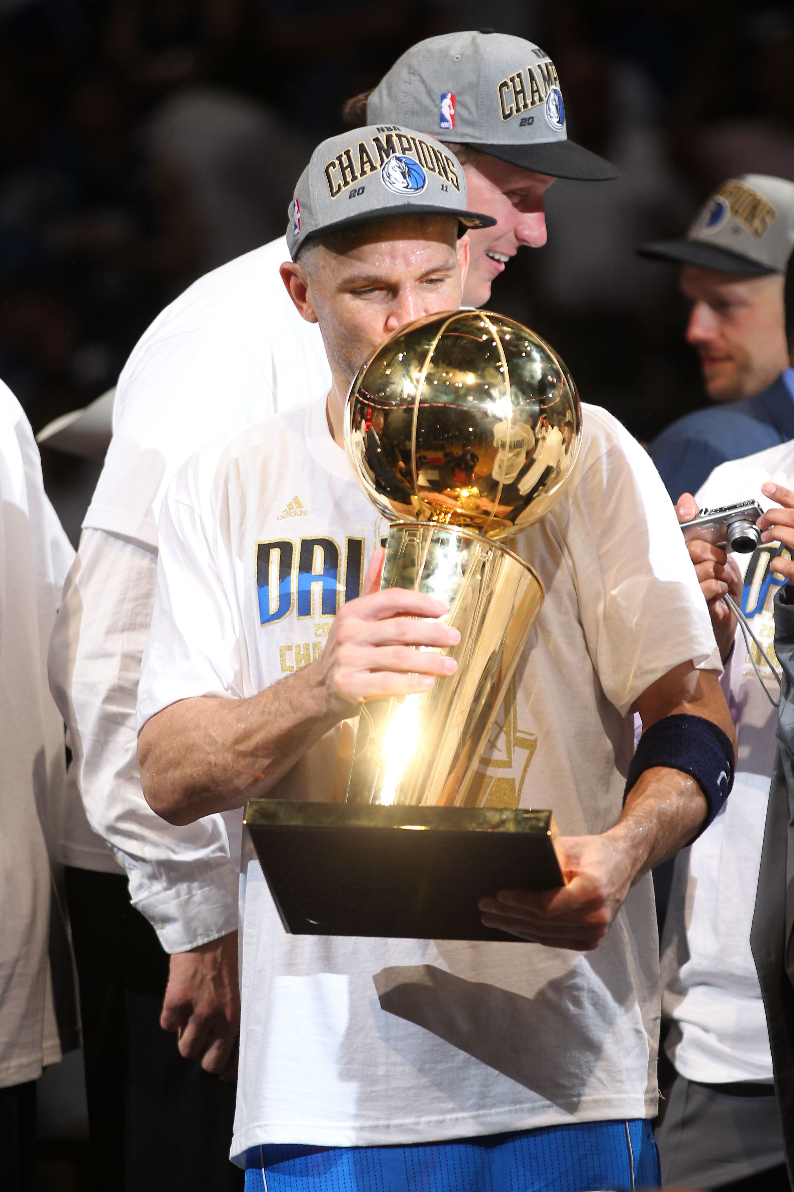 MIAMI, FL - JUNE 12:  Jason Kidd #2 of the Dallas Mavericks kisses the Larry O'Brien trophy after the Mavericks won 105-95 against the Miami Heat in Game Six of the 2011 NBA Finals at American Airlines Arena on June 12, 2011 in Miami, Florida. NOTE TO USE