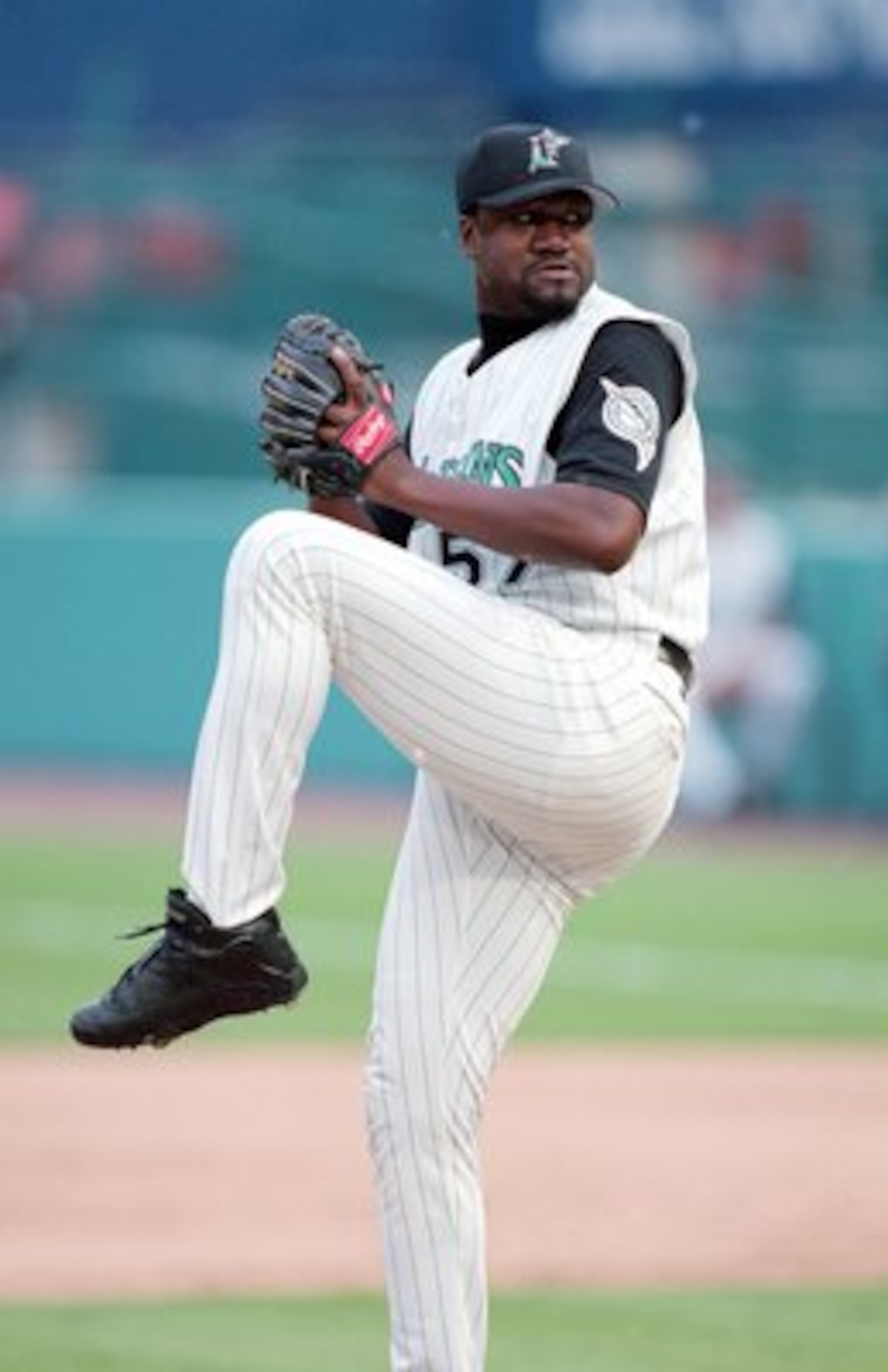 30 Jul 2000: Antonio Alfonseca #57 of the Florida Marlins winds back to pitch the ball during the game against the Arizona Diamondbacks at the Pro Player Stadium in Miami, Florida. The Marlins defeated the Diamondbacks 4-3.Mandatory Credit: Eliot J. Schec