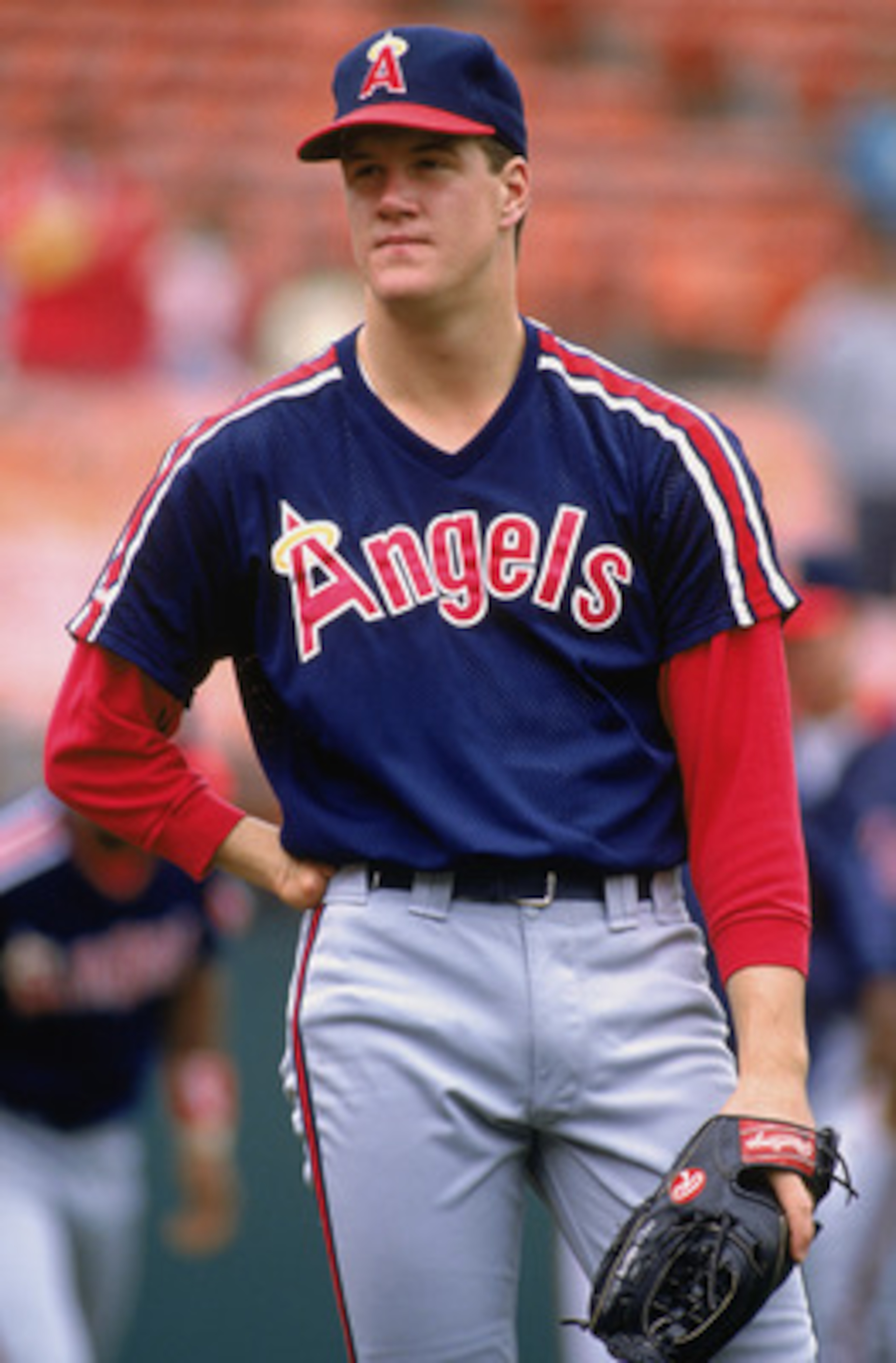 1989:  Pitcher Jim Abbot #25 of the California Angels looks on in practice during the 1989 MLB season.  (Photo by Otto Greule Jr/Getty Images)