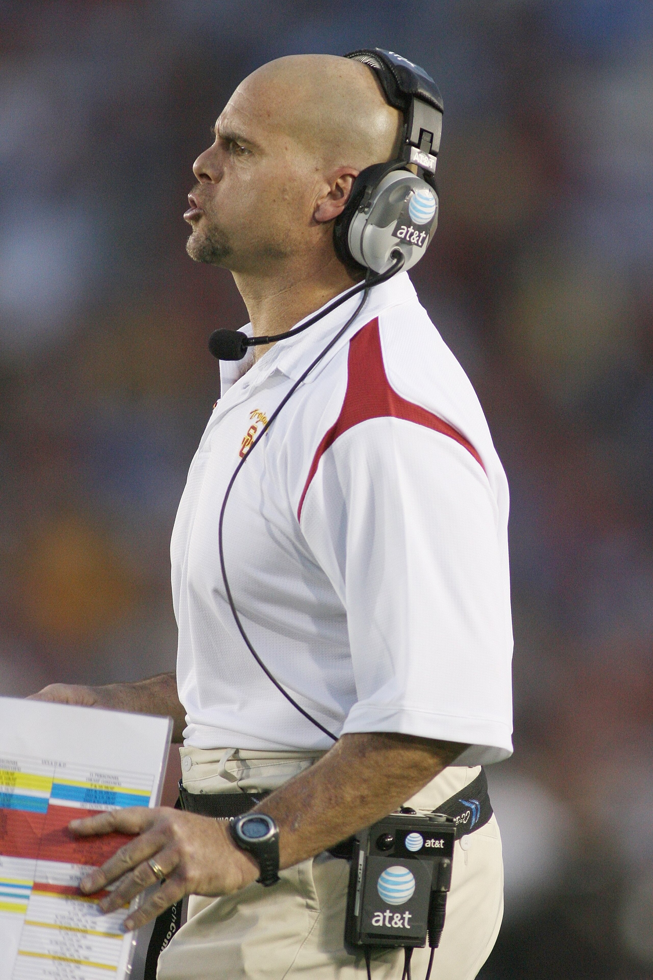 PASADENA, CA - DECEMBER 6:  Defensive coordinator Nick Holt of the USC Trojans shouts instructions to the defense against the UCLA Bruins on December 6, 2008 at the Rose Bowl in Pasadena, California.  USC won 28-7.  (Photo by Jeff Golden/Getty Images)