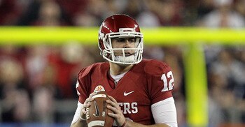 GLENDALE, AZ - JANUARY 01:  Landry Jones #12 of the Oklahoma Sooners looks to throw the ball against the Connecticut Huskies during the Tostitos Fiesta Bowl at the Universtity of Phoenix Stadium on January 1, 2011 in Glendale, Arizona.  (Photo by Ronald M