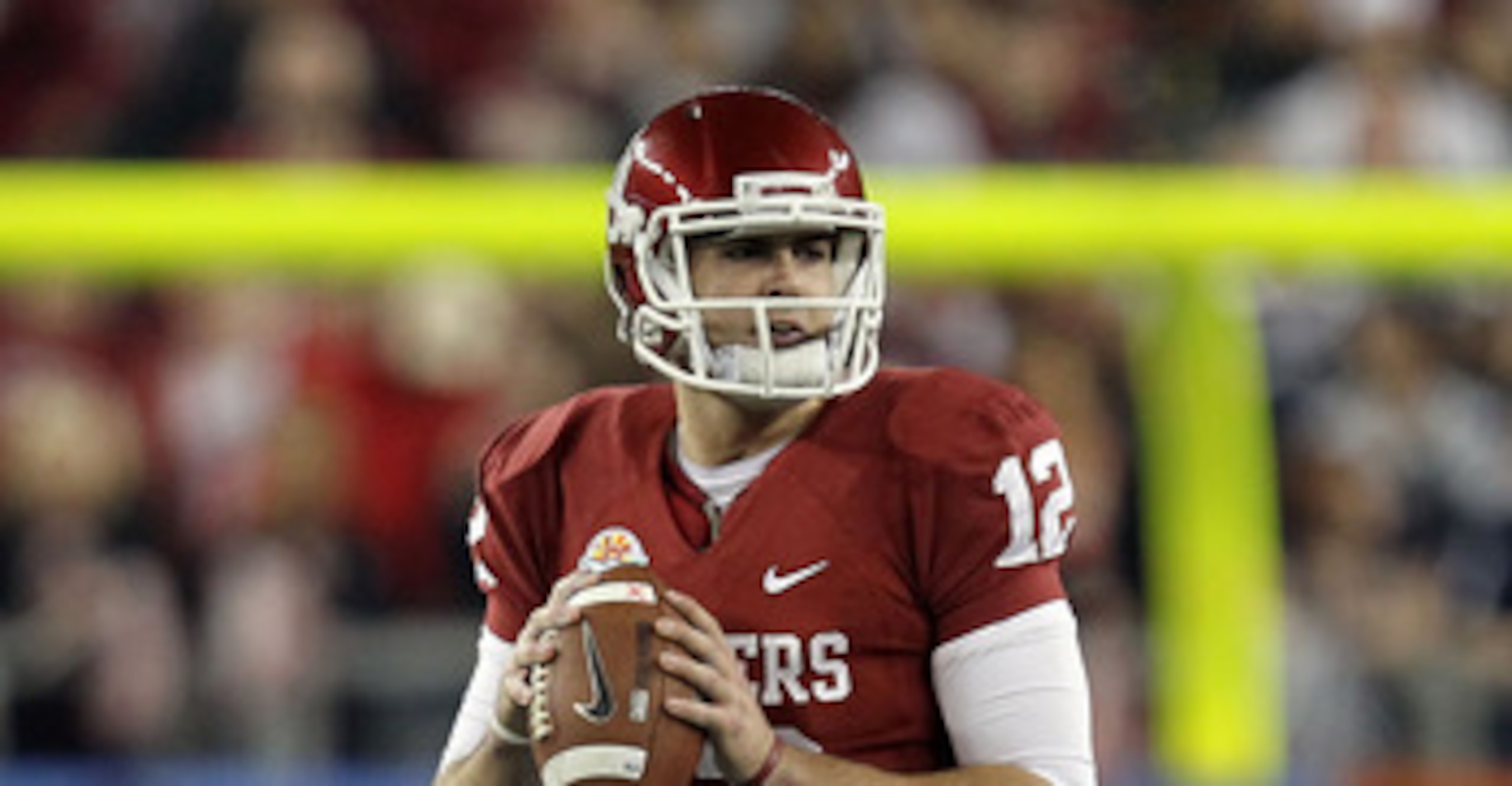 GLENDALE, AZ - JANUARY 01: Landry Jones #12 of the Oklahoma Sooners looks to throw the ball against the Connecticut Huskies during the Tostitos Fiesta Bowl at the Universtity of Phoenix Stadium on January 1, 2011 in Glendale, Arizona. (Photo by Ronald M GLENDALE, AZ - JANUARY 01: Landry Jones #12 of the Oklahoma Sooners looks to throw the ball against the Connecticut Huskies during the Tostitos Fiesta Bowl at the Universtity of Phoenix Stadium on January 1, 2011 in Glendale, Arizona. (Photo by Ronald M